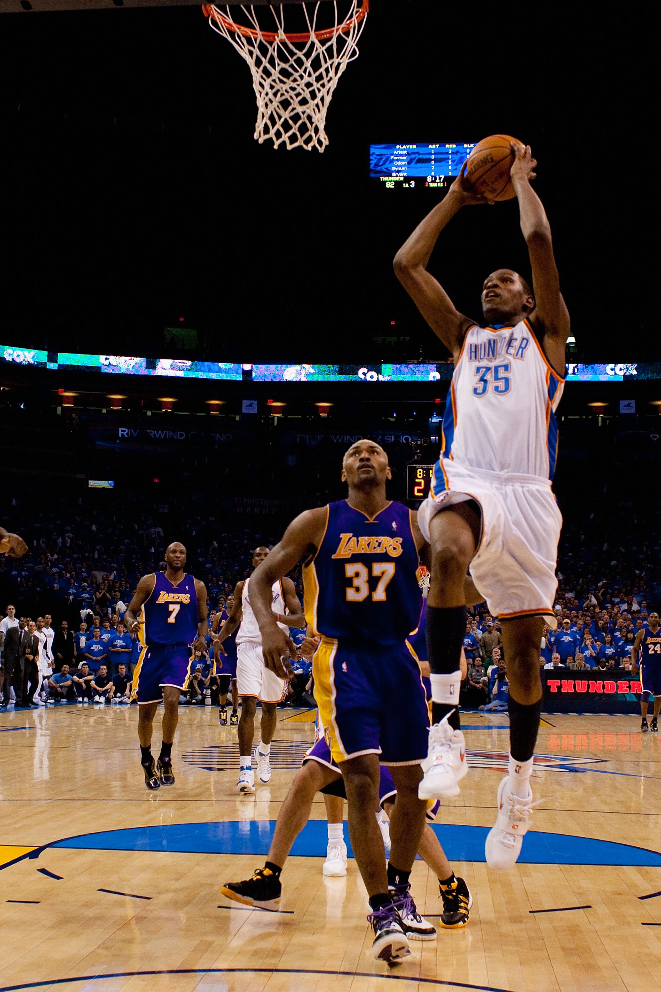 OKLAHOMA CITY - APRIL 22: Kevin Durant #35 of the Oklahoma City Thunder dunks the ball against Ron Artest #37 of the Los Angeles Lakers during Game Three of the Western Conference Quarterfinals of the 2010 NBA Playoffs on April 22, 2010 at the Ford Center