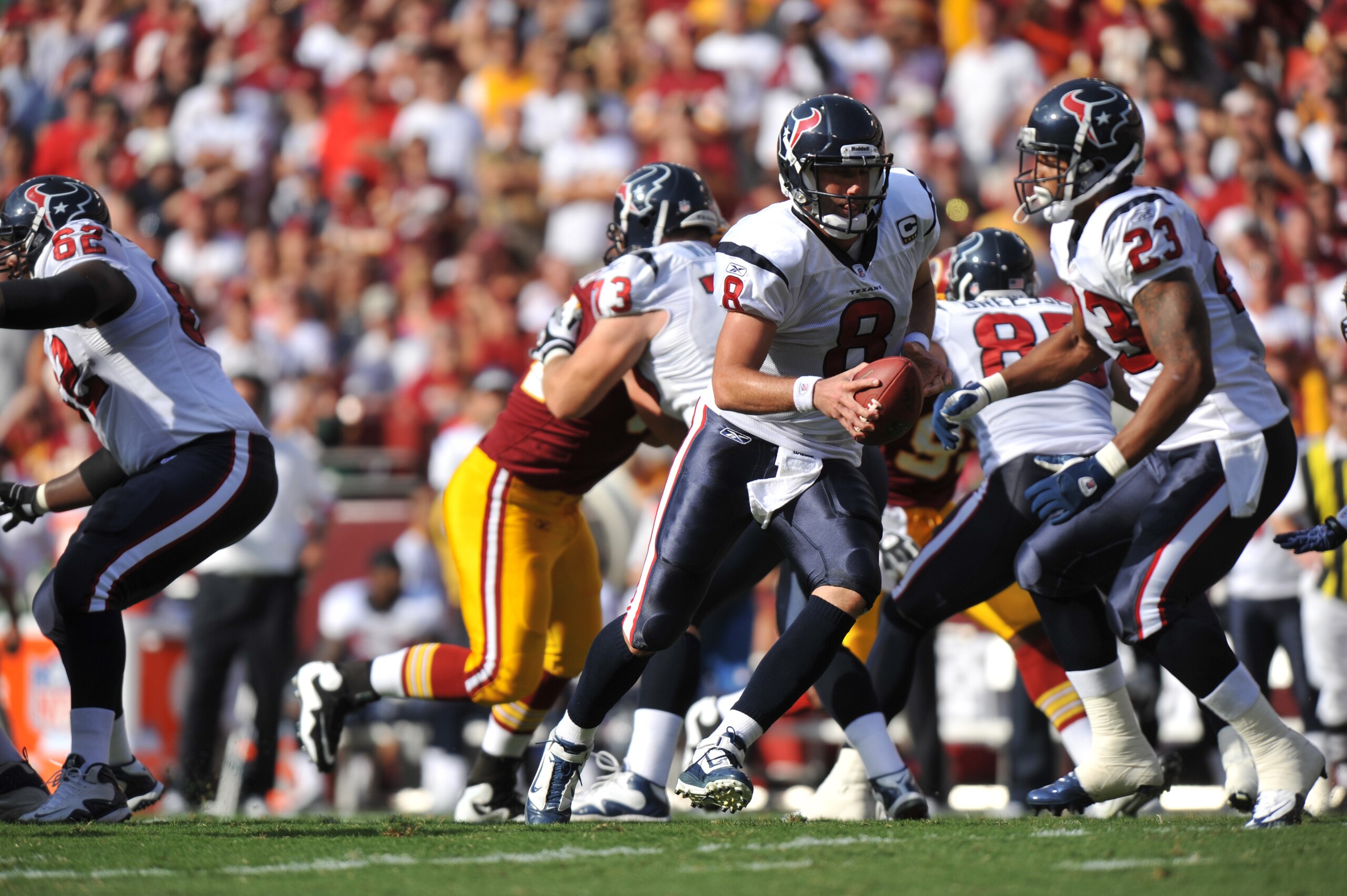 LANDOVER, MD - SEPTEMBER 19:  Matt Schaub #8 of the Houston Texans hands off to Arian Foster #23 of the Houston Texans during the game against the Washington Redskins at FedExField on September 19, 2010 in Landover, Maryland. The Texans defeated the Redsk