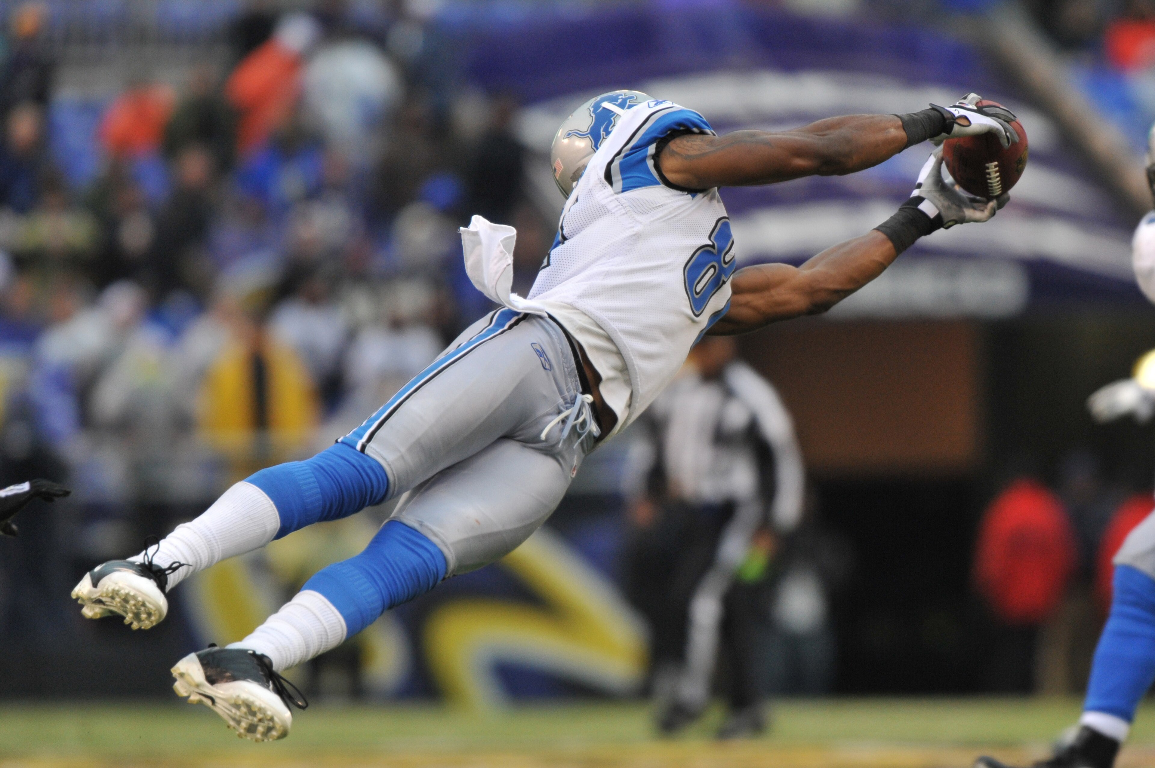 BALTIMORE - DECEMBER 13: Calvin Johnson #81 of the Detroit Lions makes a catch against the Baltimore Ravens at M&T Bank Stadium on December 13, 2009 in Baltimore, Maryland. The Ravens defeated the Lions 48-3. (Photo by Larry French/Getty Images) BALTIMORE - DECEMBER 13: Calvin Johnson #81 of the Detroit Lions makes a catch against the Baltimore Ravens at M&T Bank Stadium on December 13, 2009 in Baltimore, Maryland. The Ravens defeated the Lions 48-3. (Photo by Larry French/Getty Images)