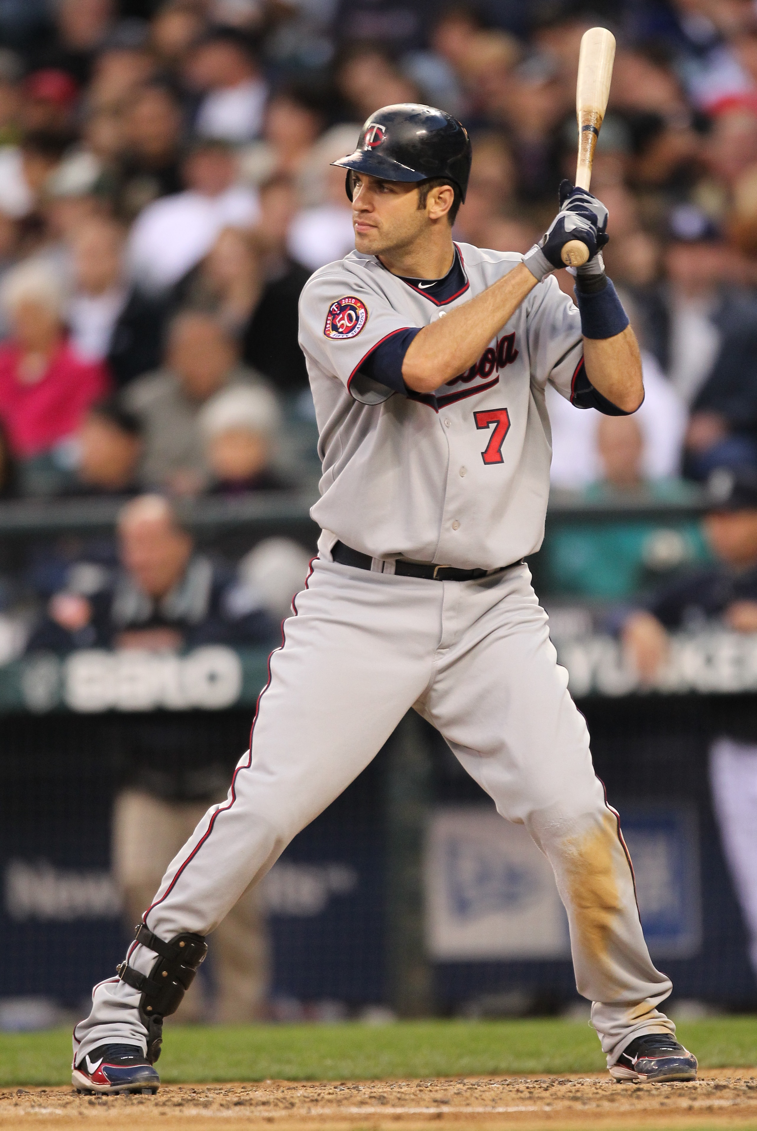 SEATTLE - AUGUST 27:  Joe Mauer #7 of the Minnesota Twins bats against the Seattle Mariners at Safeco Field on August 27, 2010 in Seattle, Washington. The Twins won 6-3. (Photo by Otto Greule Jr/Getty Images)