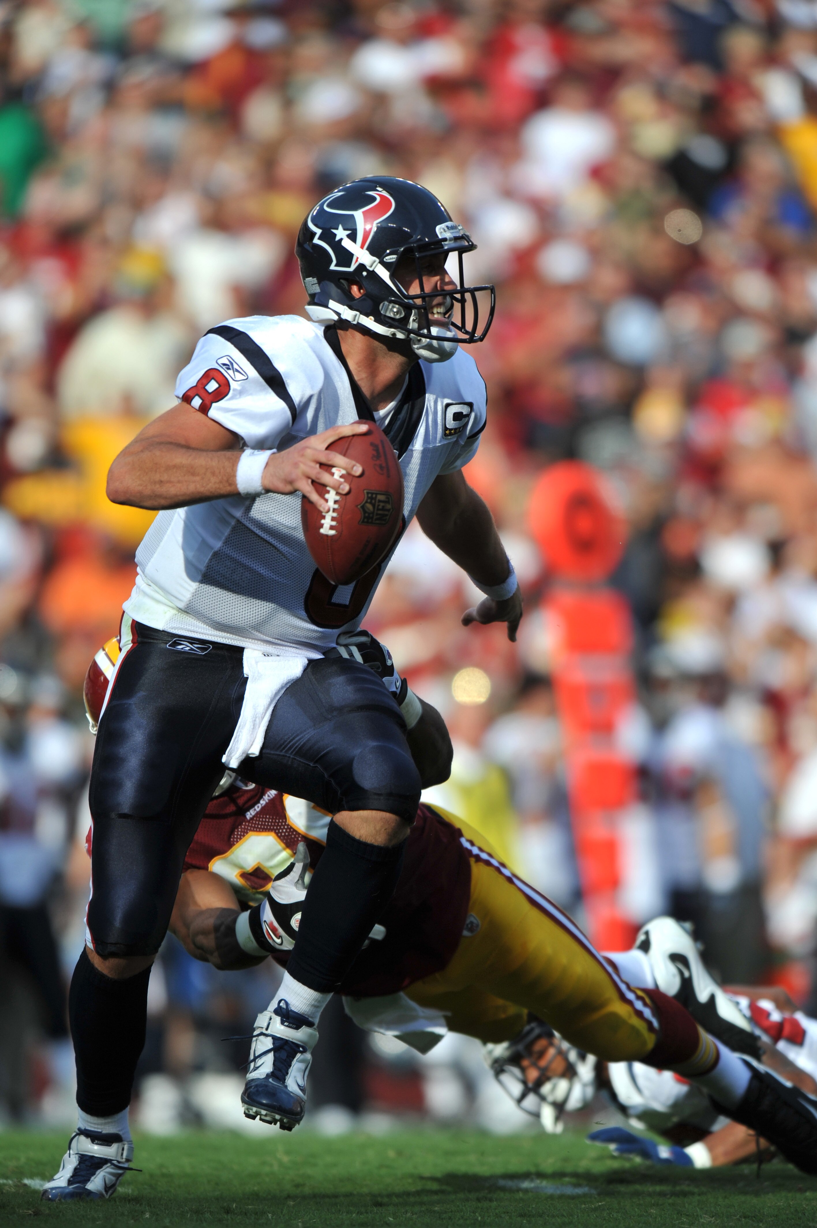 LANDOVER - SEPTEMBER 19:  Matt Schaub #8 of the Houston Texans looks for a receiver during the game against the Washington Redskins at FedExField on September 19, 2010 in Landover, Maryland. The Texans defeated the Redskins in overtime 30-27. (Photo by La