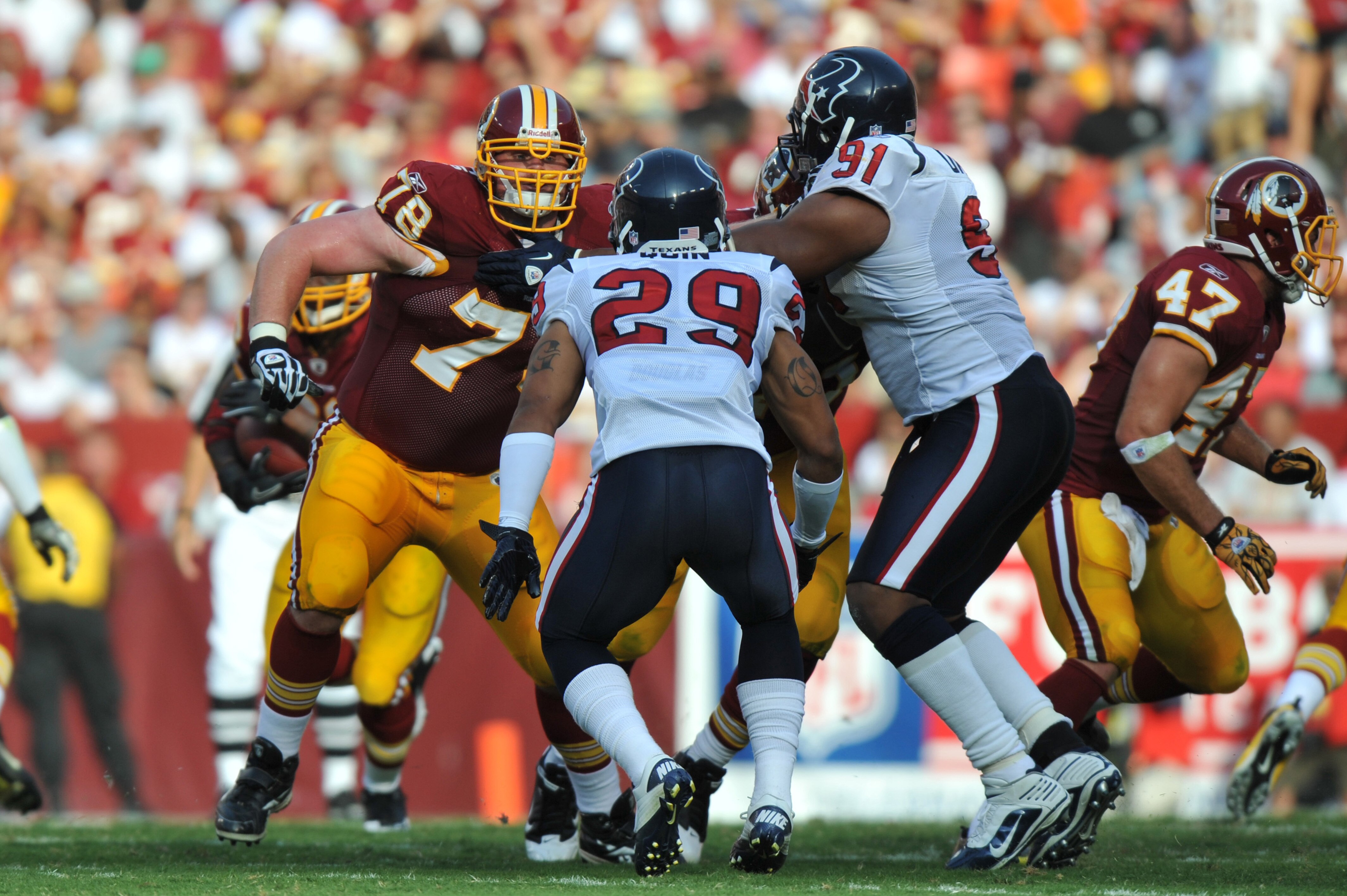 LANDOVER - SEPTEMBER 19:  Kory Lichtensteiger #78 of the Washington Redskins defends against the Houston Texans at FedExField on September 19, 2010 in Landover, Maryland. The Texans defeated the Redskins in overtime 30-27. (Photo by Larry French/Getty Ima