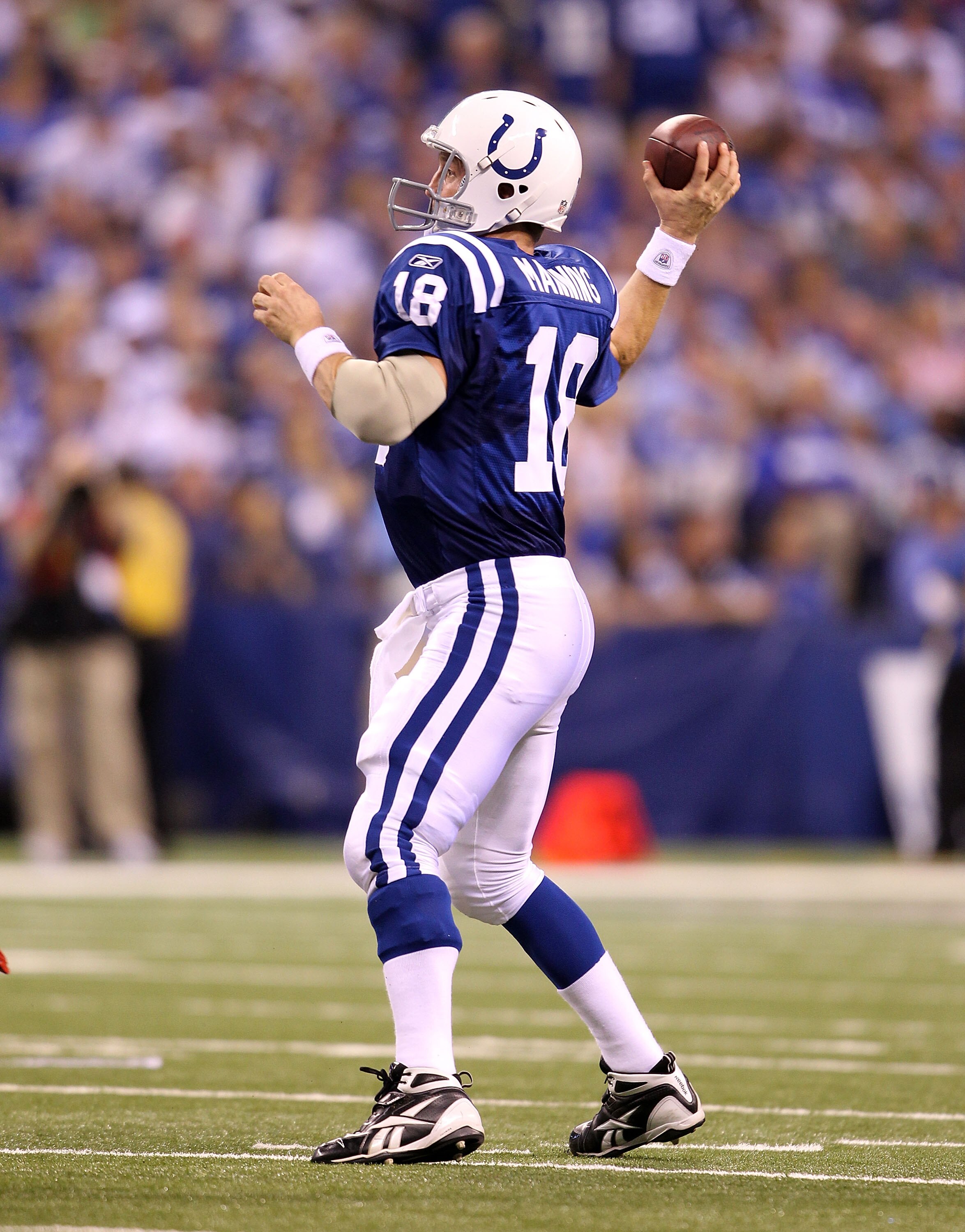 INDIANAPOLIS - SEPTEMBER 19:  Peyton Manning #18 of the Indianapolis Colts throws a pass during  the NFL game against the New York Giants  at Lucas Oil Stadium on September 19, 2010 in Indianapolis, Indiana.  (Photo by Andy Lyons/Getty Images)