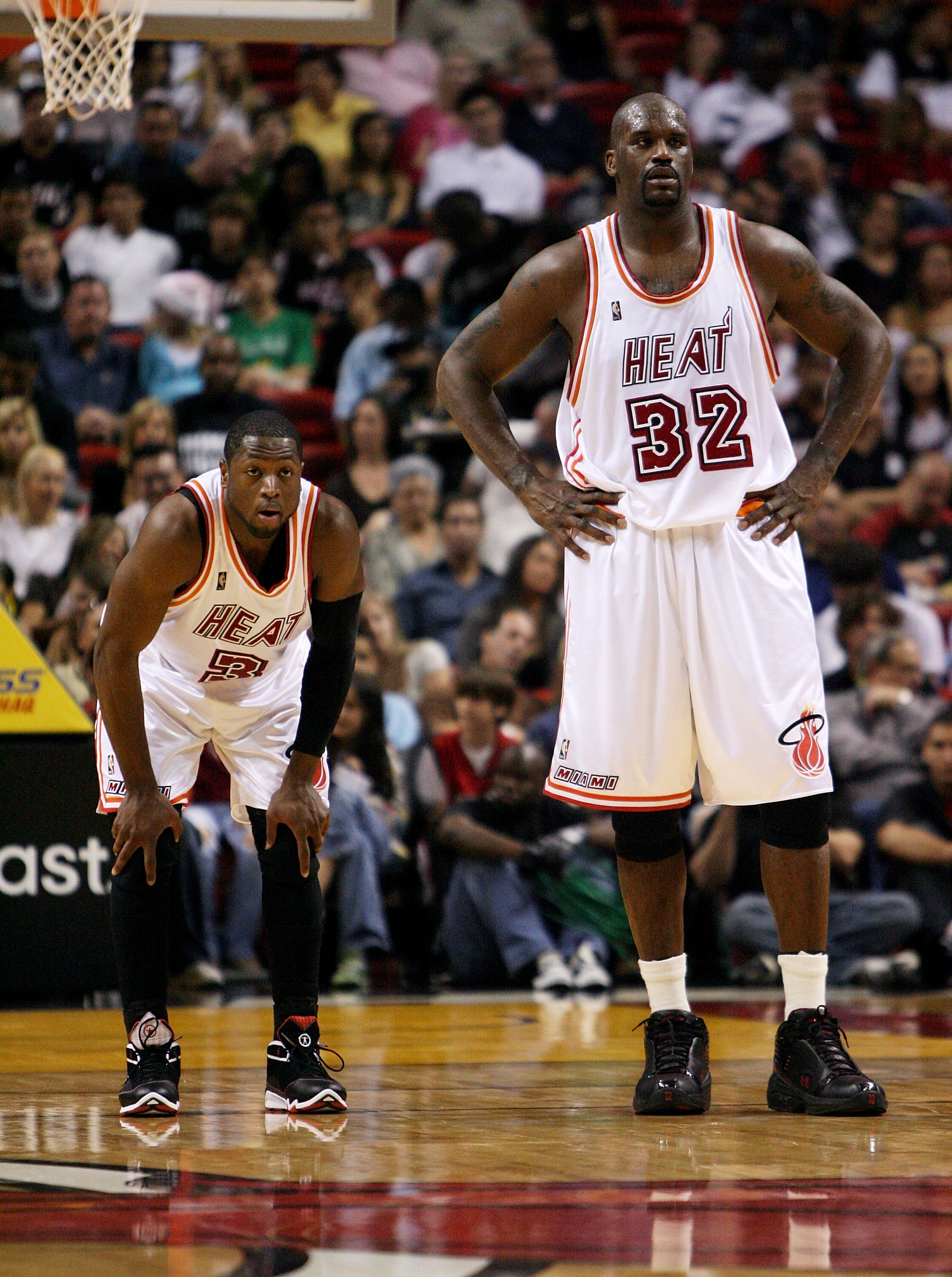 MIAMI - DECEMBER 22: Dwyane Wade #3 and Shaquille O'Neal #32 of the Miami Heat watch as the Utah Jazz shoot free throws at American Airlines Arena December 22, 2007 in Miami, Florida. The Heat defeated the Jazz 104-102. NOTE TO USER: User expressly ackno MIAMI - DECEMBER 22: Dwyane Wade #3 and Shaquille O'Neal #32 of the Miami Heat watch as the Utah Jazz shoot free throws at American Airlines Arena December 22, 2007 in Miami, Florida. The Heat defeated the Jazz 104-102. NOTE TO USER: User expressly ackno