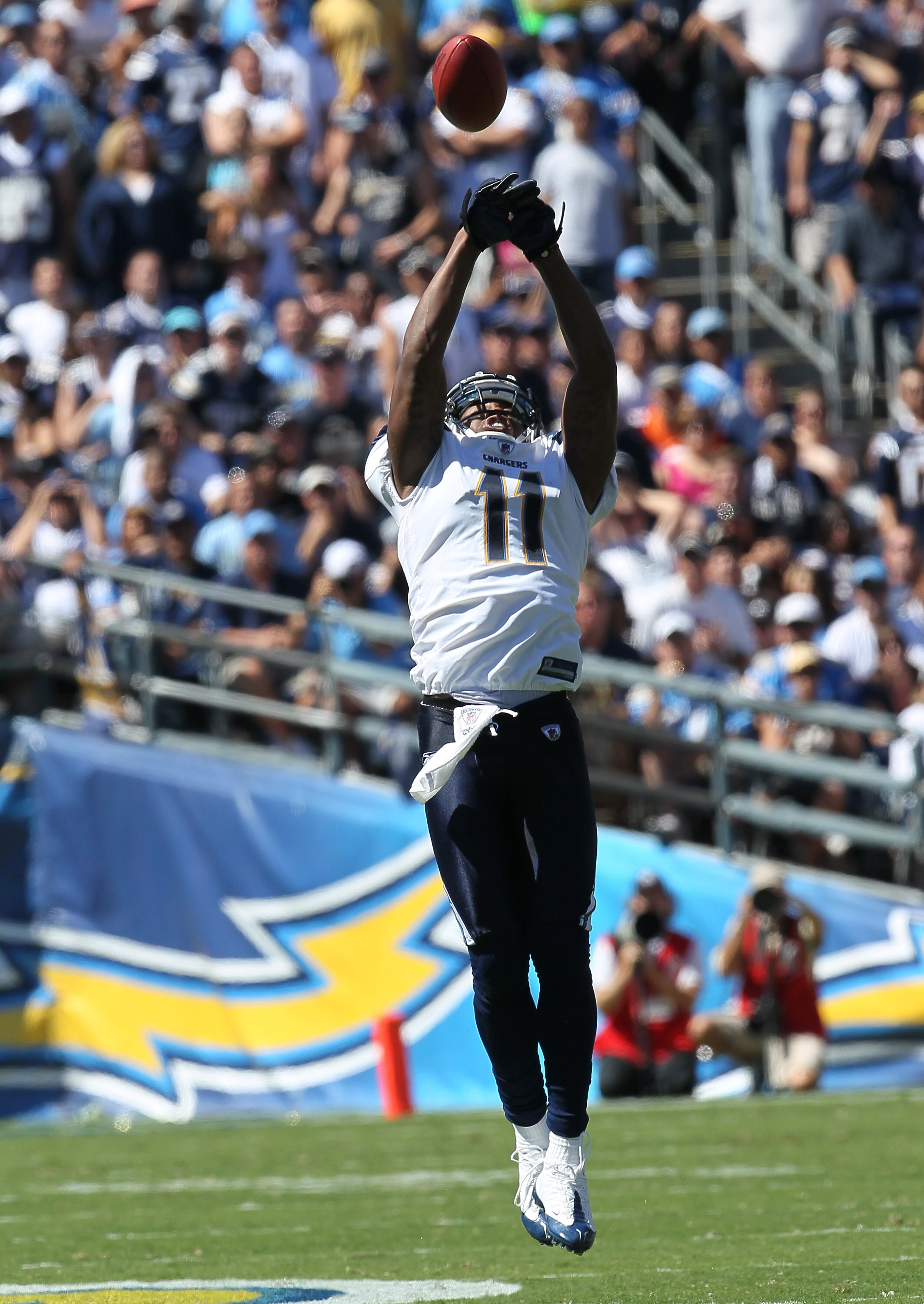 SAN DIEGO - SEPTEMBER 19: Wide receiver Legedue Naanee #11 of the San Diego Chargers reaches for a pass in the game against the Jacksonville Jaguars at Qualcomm Stadium on September 19, 2010 in San Diego, California.   The Chargers won 38-13.  (Photo by S