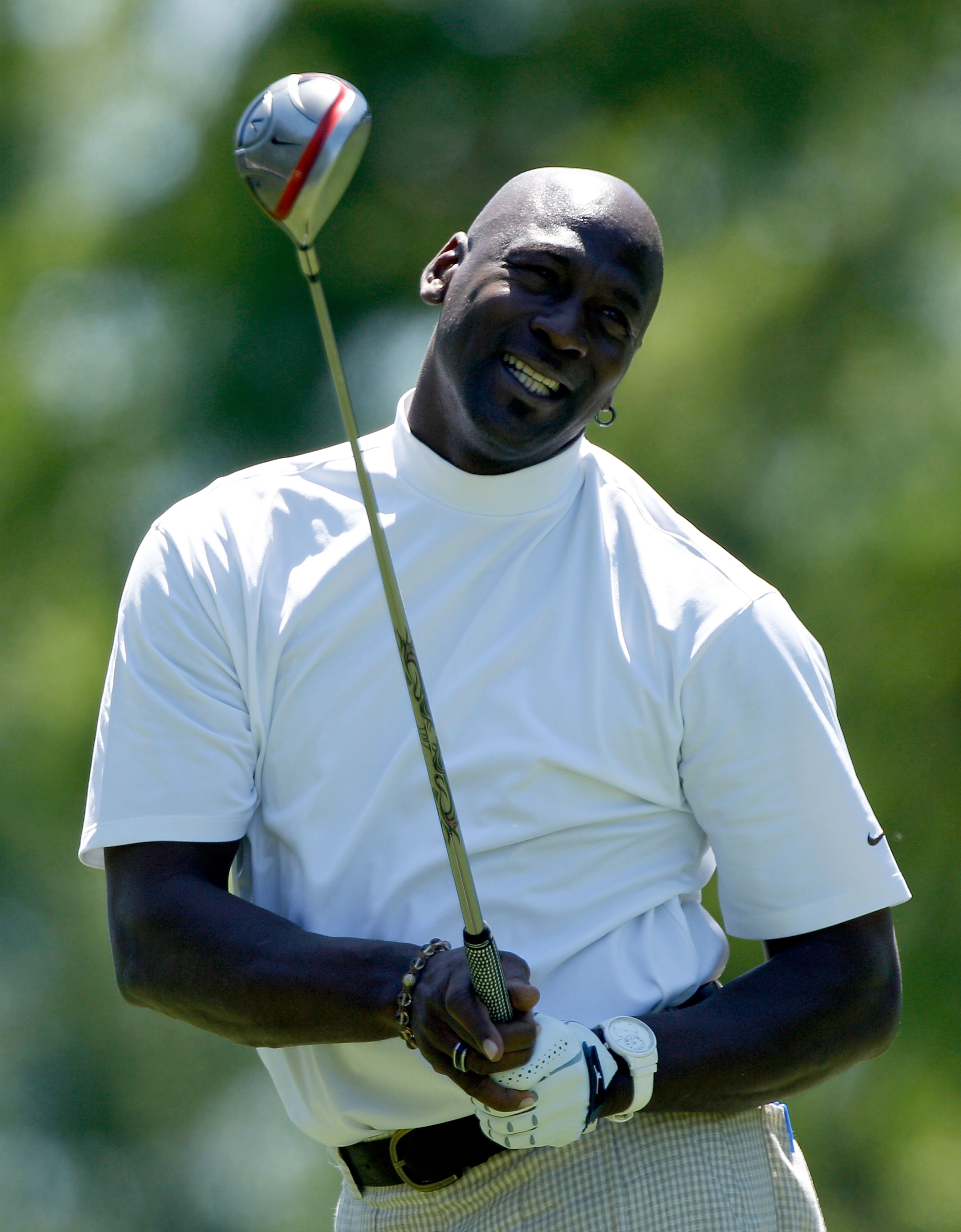 CHARLOTTE, NC - APRIL 28:  Basketball legend Michael Jordan watches a shot during the pro am prior to the start of the 2010 Quail Hollow Championship at the Quail Hollow Club on April 28, 2010 in Charlotte, North Carolina.  (Photo by Scott Halleran/Getty 