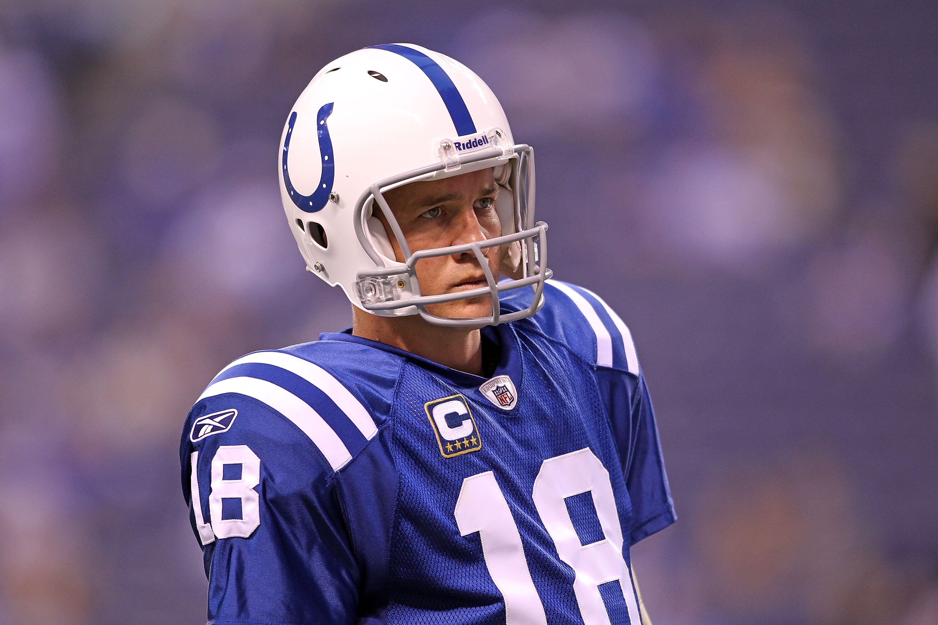 INDIANAPOLIS - SEPTEMBER 19:  Peyton Manning #18 of the Indianapolis Colts waits to throw the ball during  warmups before the NFL game against the New York Giants  at Lucas Oil Stadium on September 19, 2010 in Indianapolis, Indiana.  (Photo by Andy Lyons/