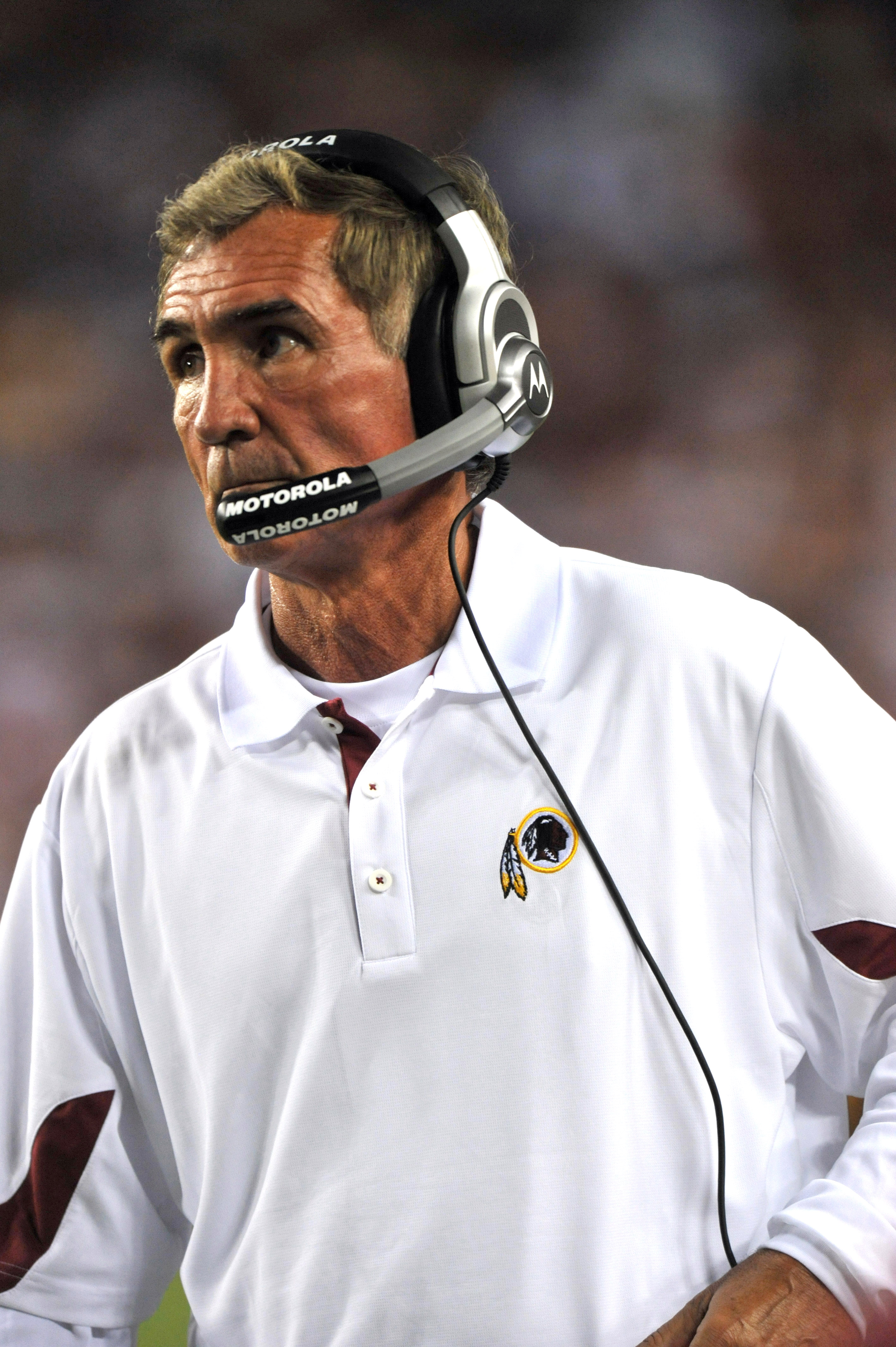 LANDOVER - SEPTEMBER 12:  Head coach Mike Shanahan of the Washington Redskins coaches during the NFL season opener against the Dallas Cowboys at FedExField on September 12, 2010 in Landover, Maryland. The Redskins defeated the Cowboys 13-7. (Photo by Larr