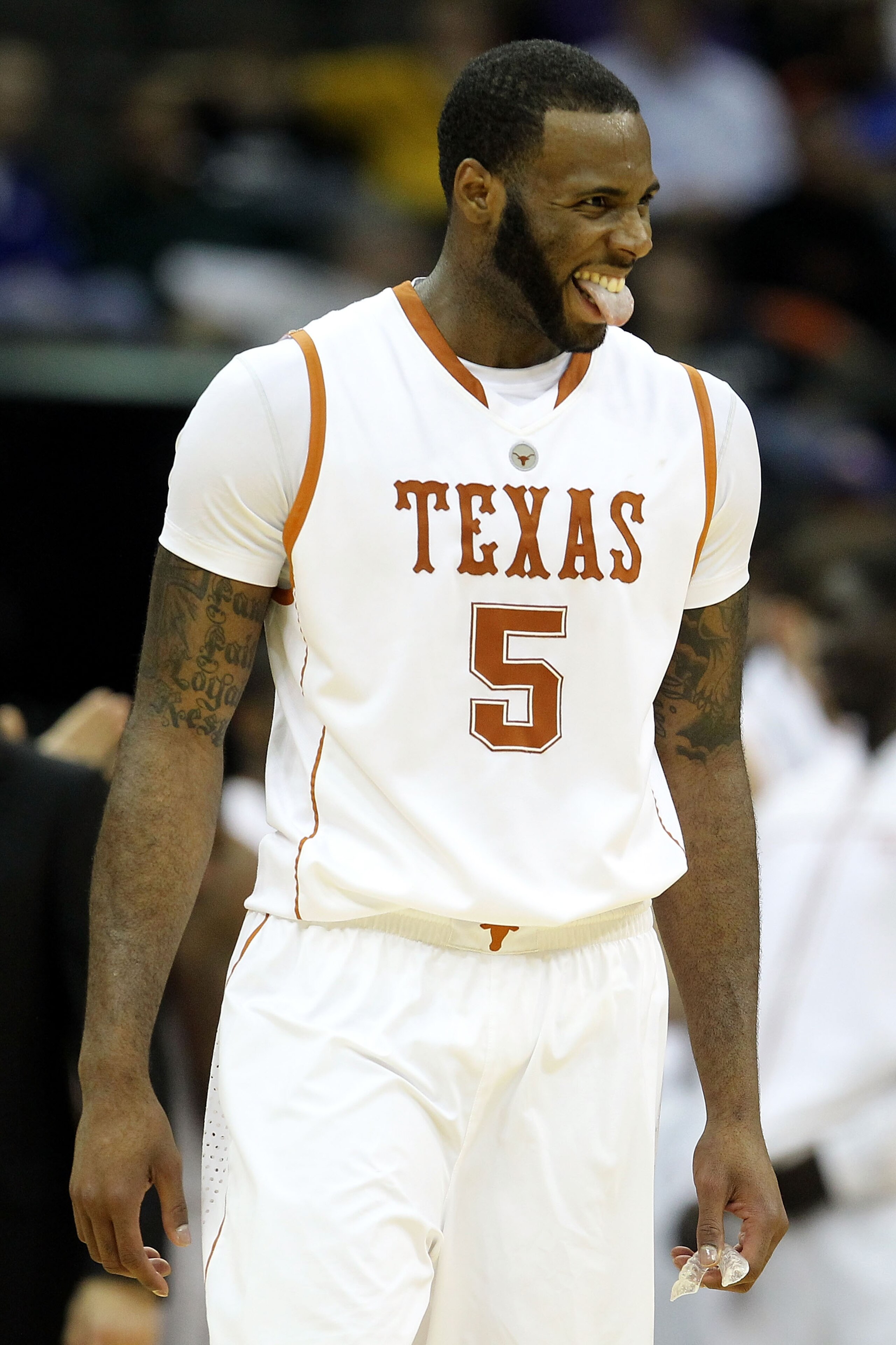 KANSAS CITY, MO - MARCH 10:  Damion James #5 of the Texas Longhorns reacts in the second half while taking on the Iowa State Cyclones during the first round game of the 2010 Phillips 66 Big 12 Men's Basketball Tournament at the Sprint Center on March 10,