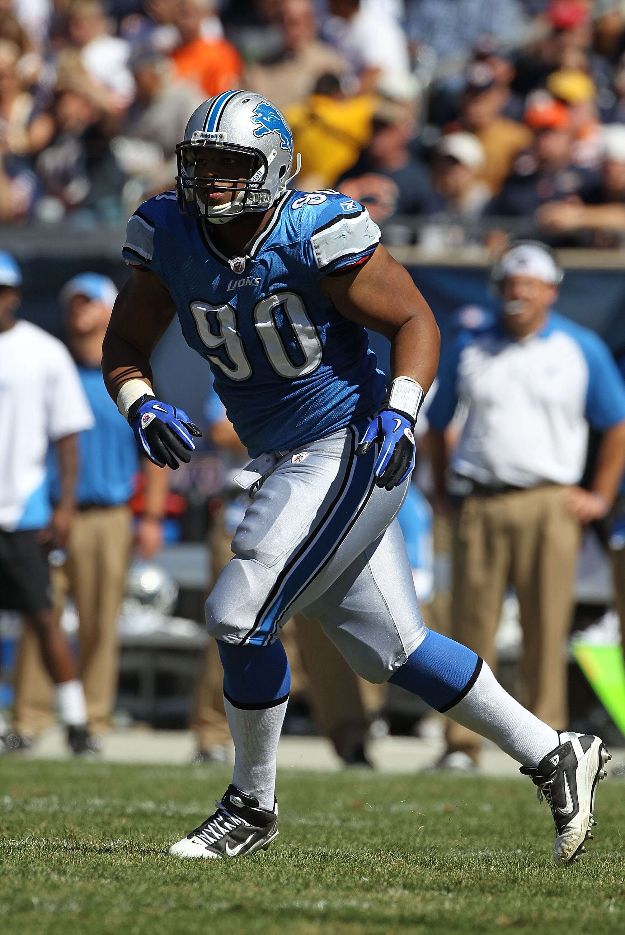 CHICAGO - SEPTEMBER 12: Ndamukong Suh #90 of the Detroit Lions chases a runner against the Chicago Bears during the NFL season opening game at Soldier Field on September 12, 2010 in Chicago, Illinois. The Bears defeated the Lions 19-14. (Photo by Jonathan
