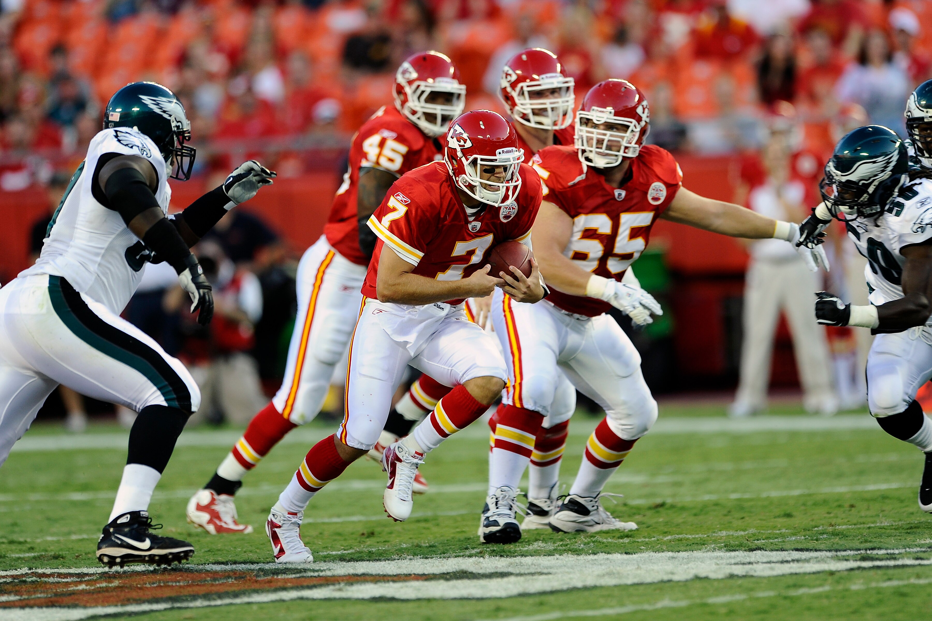 KANSAS CITY, MO - AUGUST 27: Matt Cassel #7 of the Kansas City Chiefs runs away from pressure during a preseason game against the Philadelphia Eagles at Arrowhead Stadium on August 27, 2010 in Kansas City, Missouri.  (Photo by G. Newman Lowrance/Getty Ima