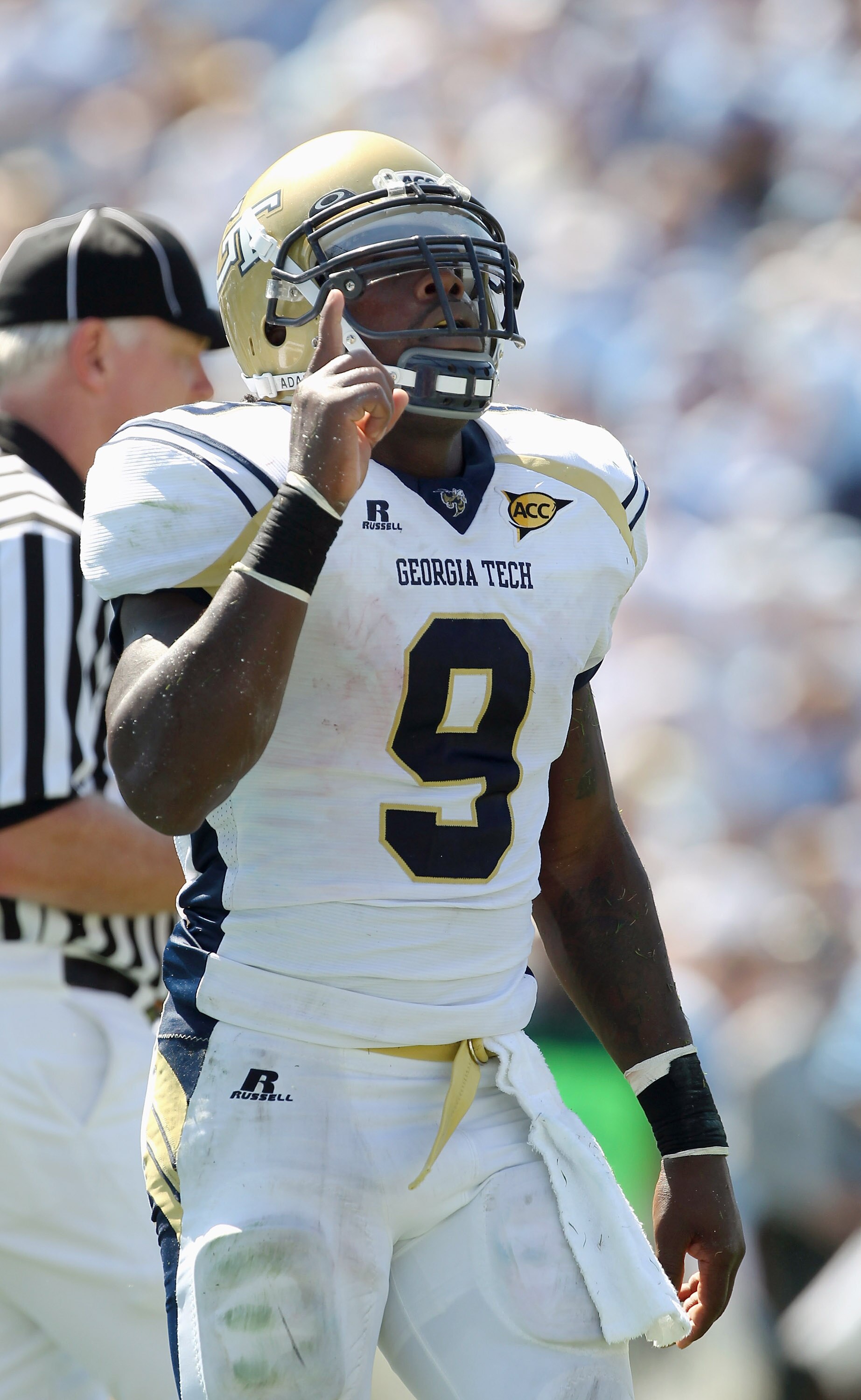 CHAPEL HILL, NC - SEPTEMBER 18:  Joshua Nesbitt #9 of the Georgia Tech Yellow Jackets reacts to a touchdown against the North Carolina Tar Heels during their game at Kenan Stadium on September 18, 2010 in Chapel Hill, North Carolina.  (Photo by Streeter L