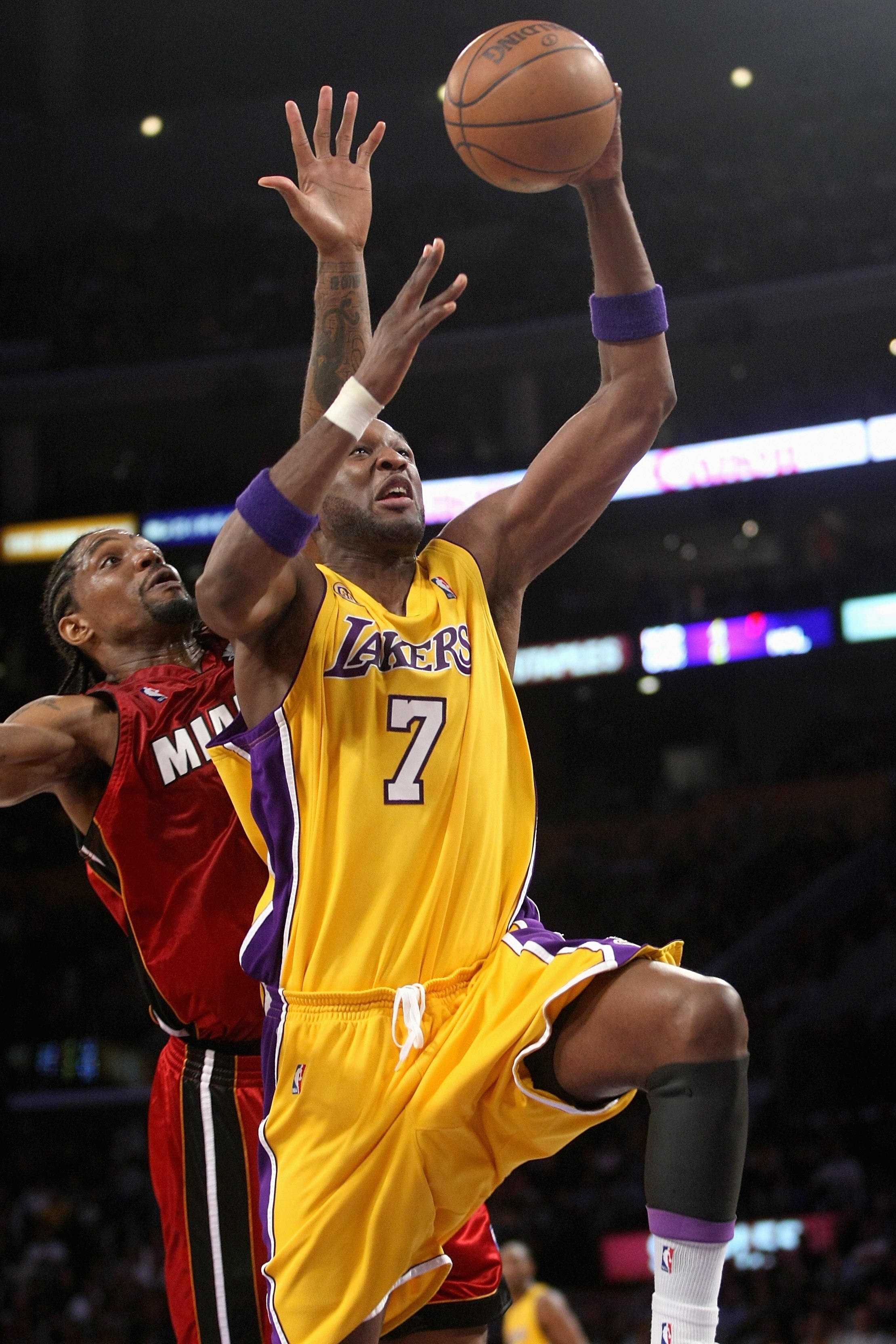 LOS ANGELES - FEBRUARY 28:  Lamar Odom #7 of the Los Angeles Lakers goes to the basket past Udonis Haslem #40 of the Miami Heat during the game on February 28, 2008 at Staples Center in Los Angeles, California.  The Lakers won 106-88. NOTE TO USER: User e
