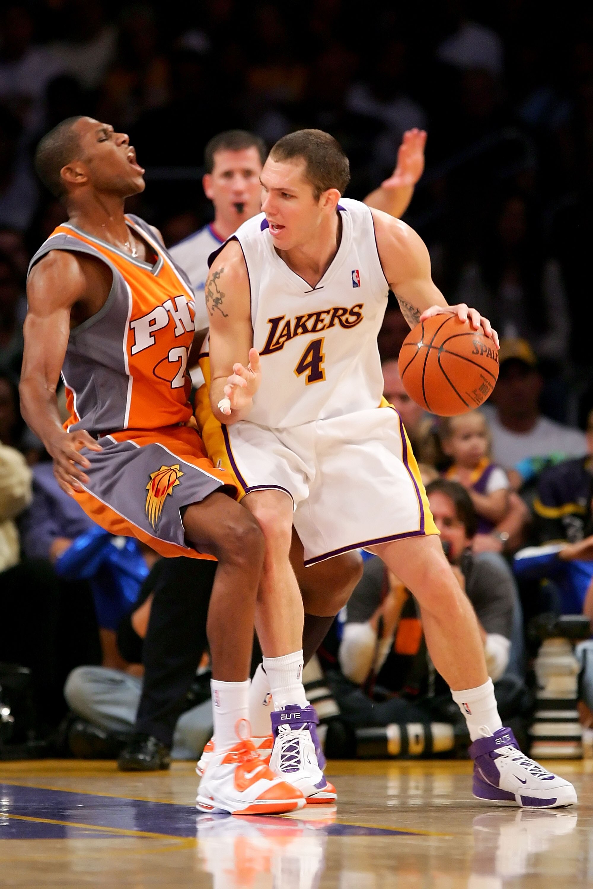 LOS ANGELES - APRIL 29:  Luke Walton #4 of the Los Angeles Lakers goes up against James Jones #22 of the Phoenix Suns in Game Four of the Western Conference Quarterfinals during the 2007 NBA Playoff at Staples Center on April 29, 2007 in Los Angeles, Cali