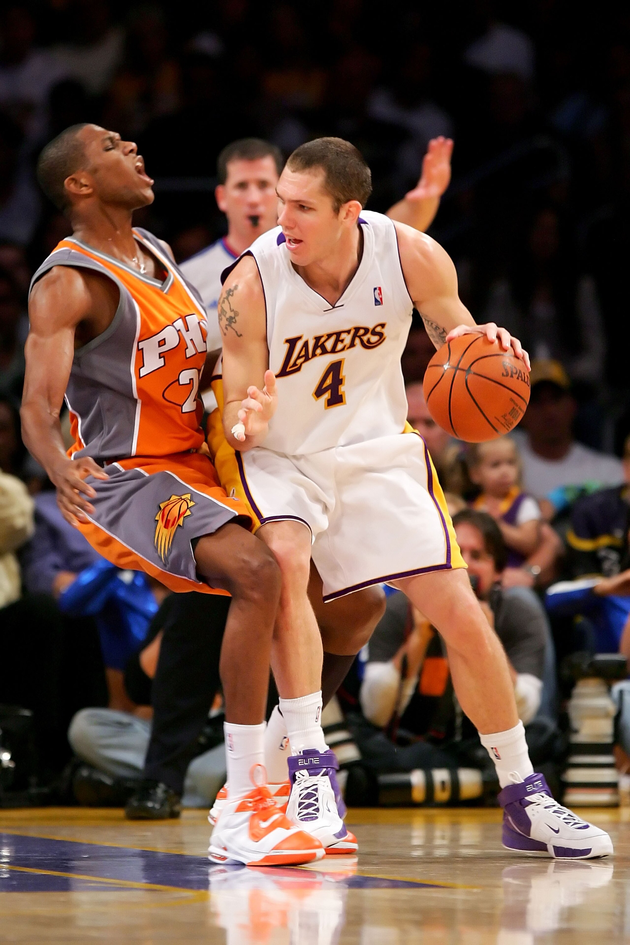 LOS ANGELES - APRIL 29: Luke Walton #4 of the Los Angeles Lakers goes up against James Jones #22 of the Phoenix Suns in Game Four of the Western Conference Quarterfinals during the 2007 NBA Playoff at Staples Center on April 29, 2007 in Los Angeles, Cali LOS ANGELES - APRIL 29: Luke Walton #4 of the Los Angeles Lakers goes up against James Jones #22 of the Phoenix Suns in Game Four of the Western Conference Quarterfinals during the 2007 NBA Playoff at Staples Center on April 29, 2007 in Los Angeles, Cali