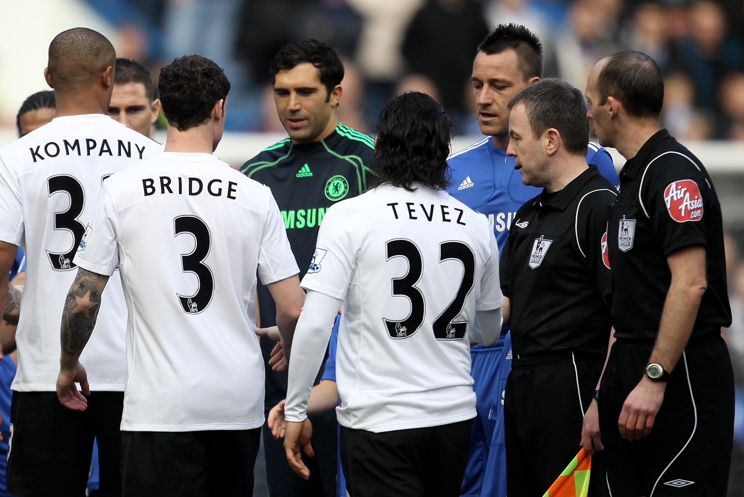 LONDON, ENGLAND - FEBRUARY 27:  John Terry of Chelsea and Wayne Bridge of Manchester City walk past each other prior to the Barclays Premier League match between Chelsea and Manchester City at Stamford Bridge on February 27, 2010 in London, England.  (Pho
