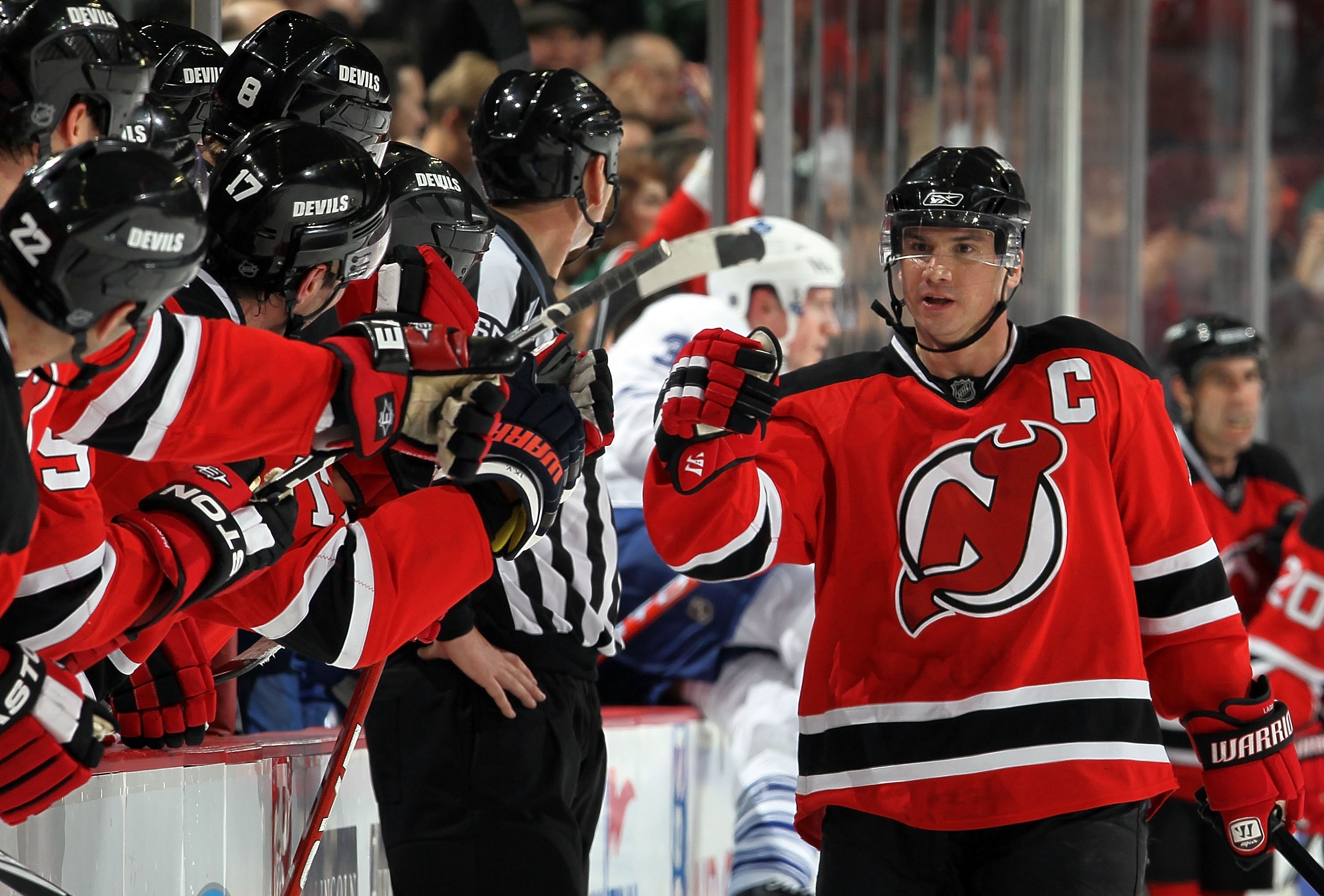 NEWARK, NJ - FEBRUARY 05:  Jamie Langenbrunner #15 of the New Jersey Devils celebrates against the Toronto Maple Leafs at the Prudential Center on February 5, 2010 in Newark, New Jersey.  (Photo by Jim McIsaac/Getty Images)