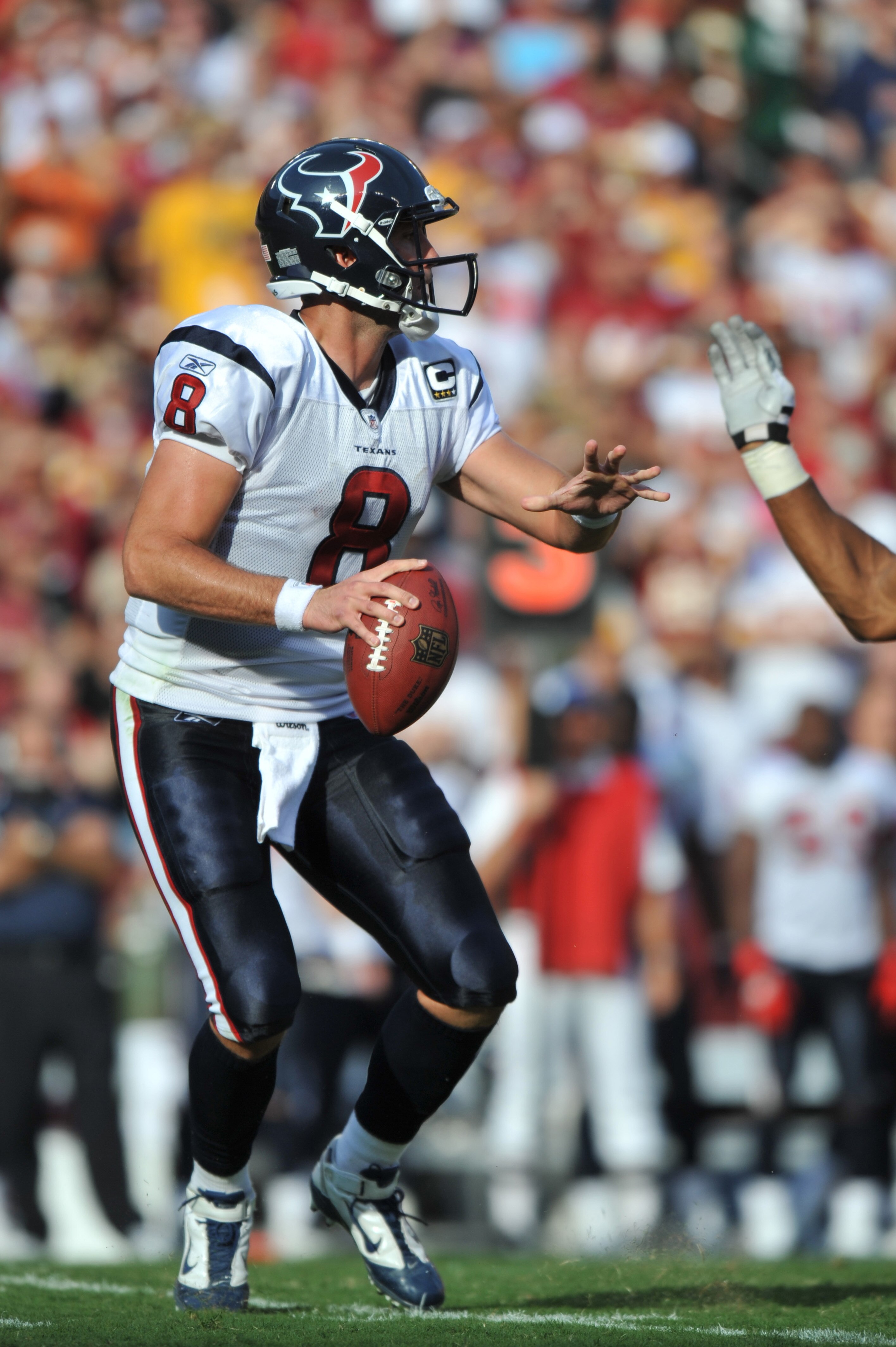 LANDOVER - SEPTEMBER 19:  Matt Schaub #8 of the Houston Texans looks for a receiver during the game against the Washington Redskins at FedExField on September 19, 2010 in Landover, Maryland. The Texans defeated the Redskins in overtime 30-27. (Photo by La