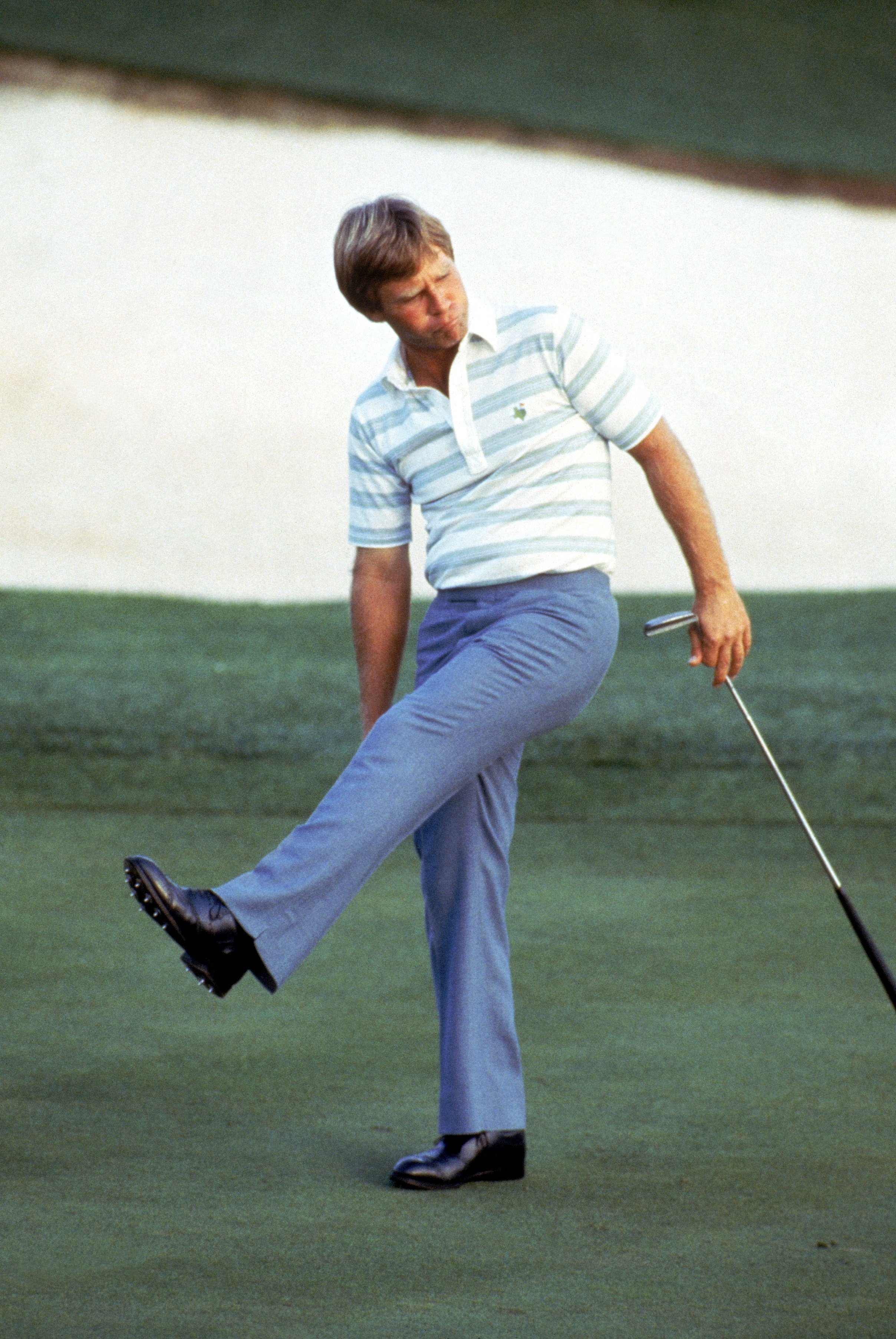 AUGUSTA - 1984:  Ben Crenshaw coaxes the ball into the hole during the 1984 U.S. Masters tournament in Augusta National Golf Club in Augusta, Georgia.  Crenshaw won the tournament and the first of two green jackets.  (Photo by David Cannon/Getty Images)