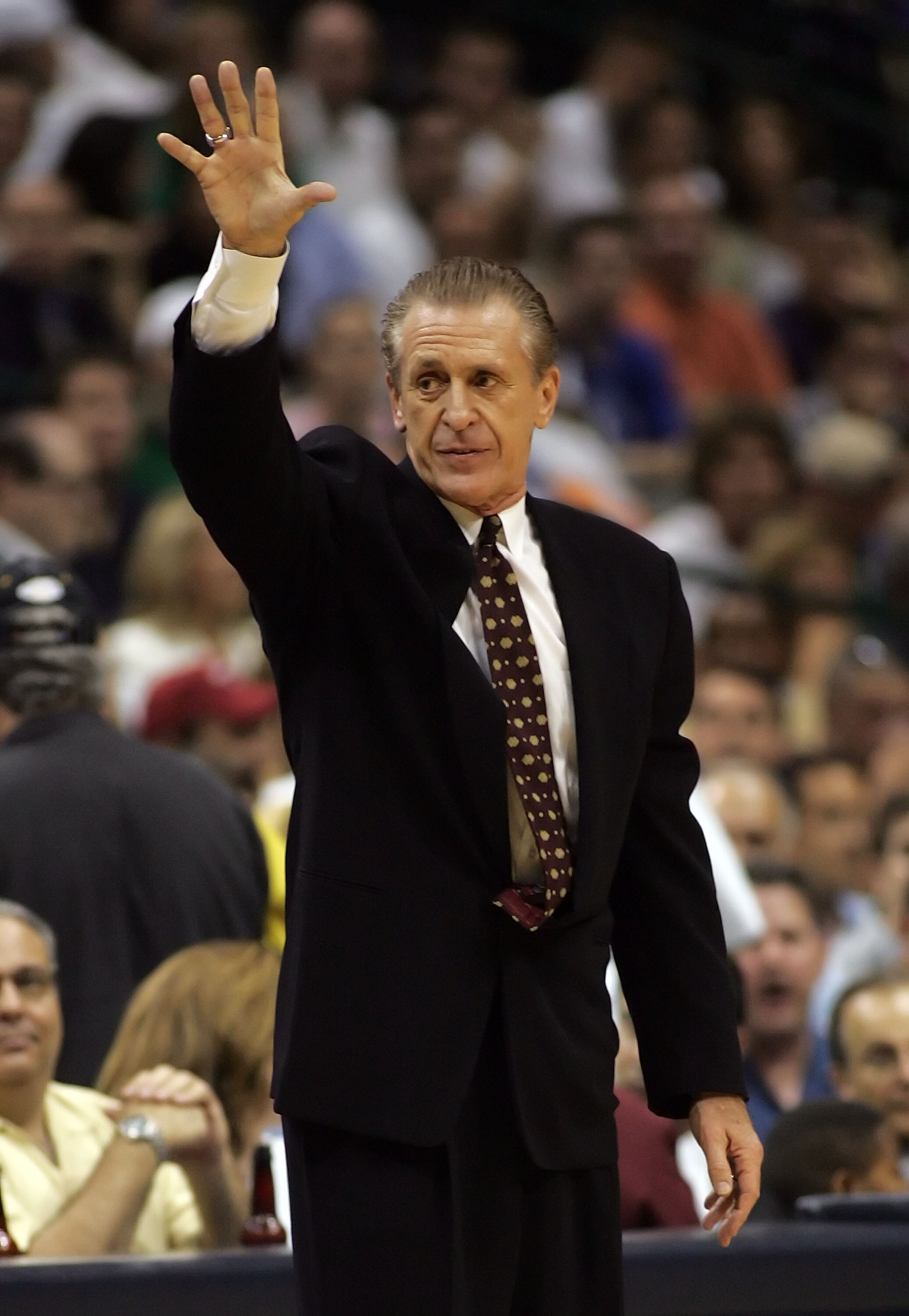DALLAS - JUNE 08: Head coach Pat Riley of the Miami Heat puts his hand up in game one of the 2006 NBA Finals against the Dallas Mavericks on June 8, 2006 at American Airlines Center in Dallas, Texas.  The Mavericks defeated the Heat 90-80 to take a 1-0 se