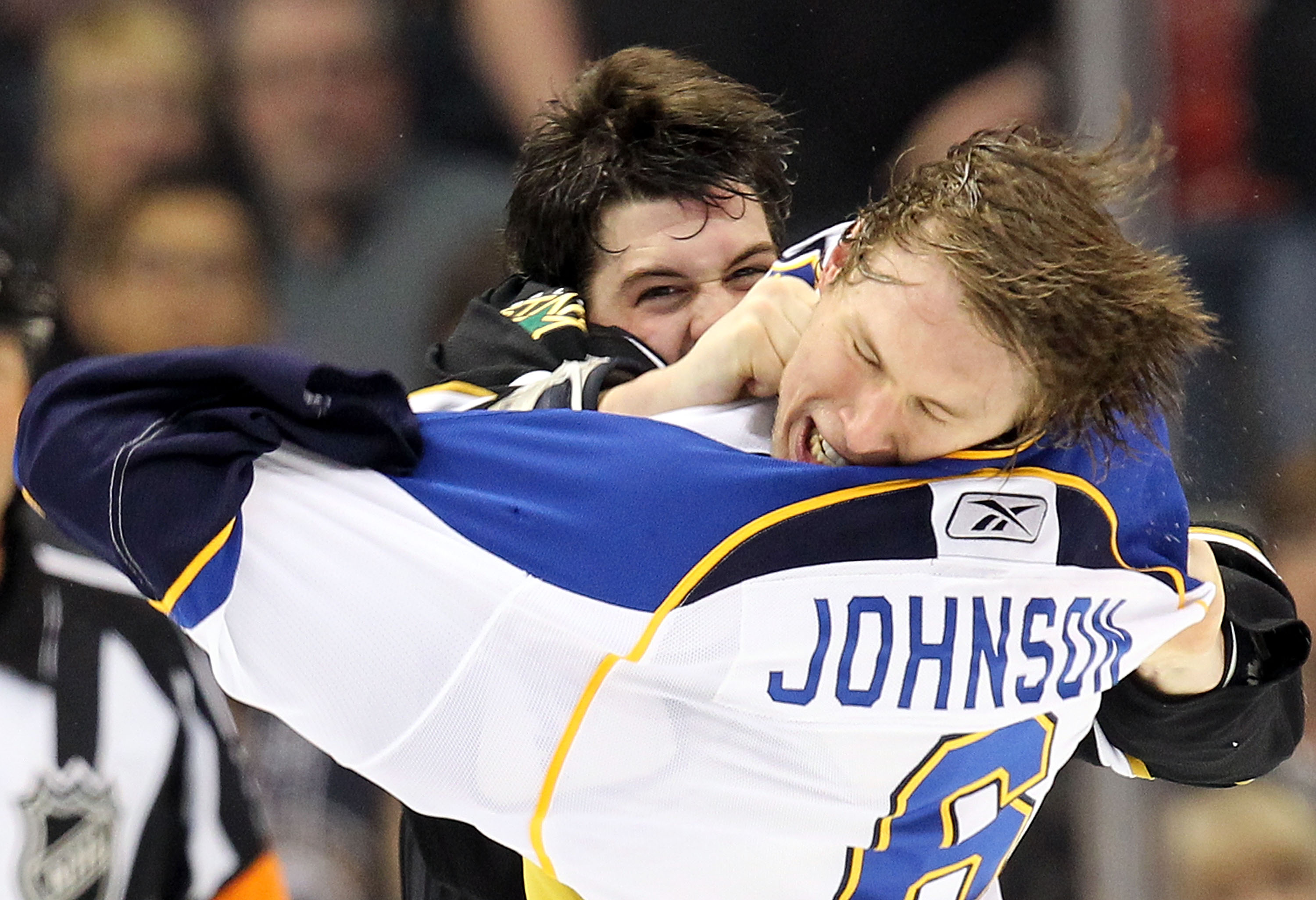 DALLAS - MARCH 04:  Left wing Jamie Benn #14 of the Dallas Stars lands a punch against Erik Johnson #6 of the St. Louis Blues in the first period at American Airlines Center on March 4, 2010 in Dallas, Texas.  (Photo by Ronald Martinez/Getty Images)