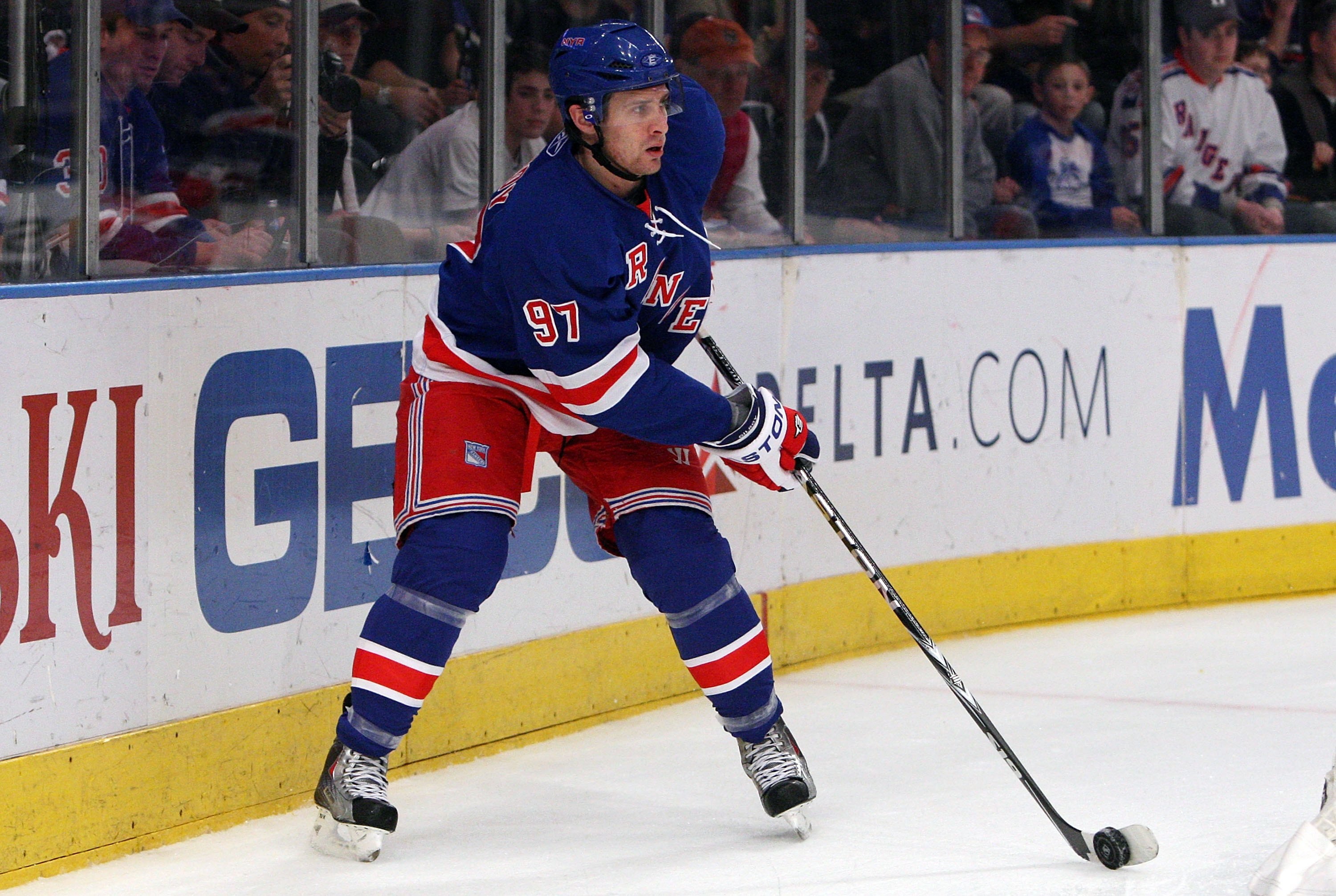NEW YORK - DECEMBER 26:  Matt Gilroy #97 of the New York Rangers skates against the New York Islanders on December 26, 2009 at Madison Square Garden in New York City.The Islanders defeated the Rangers 3-2 in overtime.  (Photo by Jim McIsaac/Getty Images)