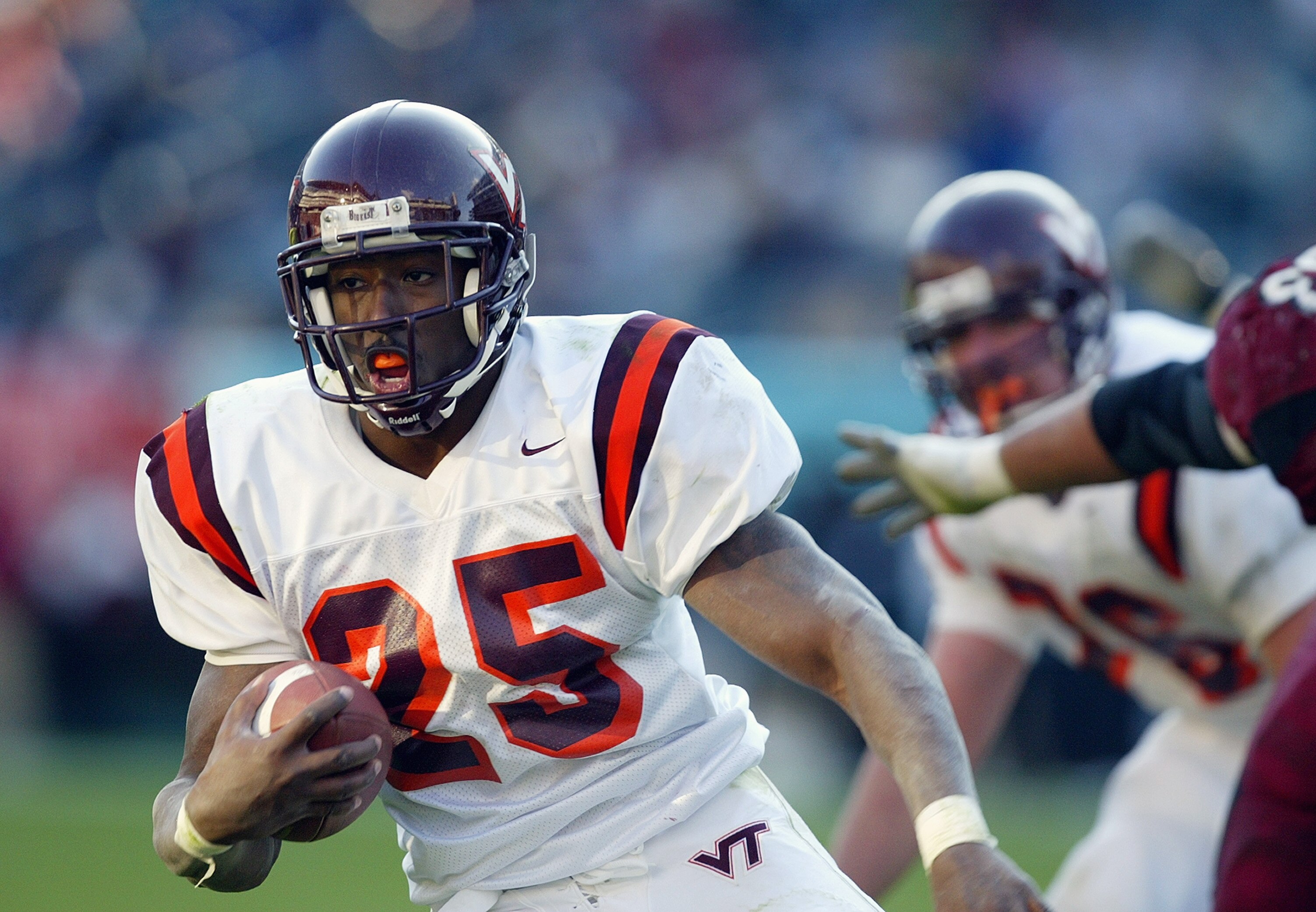 PHILADELPHIA - NOVEMBER 15:  Running back Kevin Jones #25 of the Virginia Tech Hokies runs with the ball during the game against the Temple Owls on November 15, 2003 at Lincoln Financial Field in Philadelphia, Pennsylvania. Virginia Tech defeated Temple 2