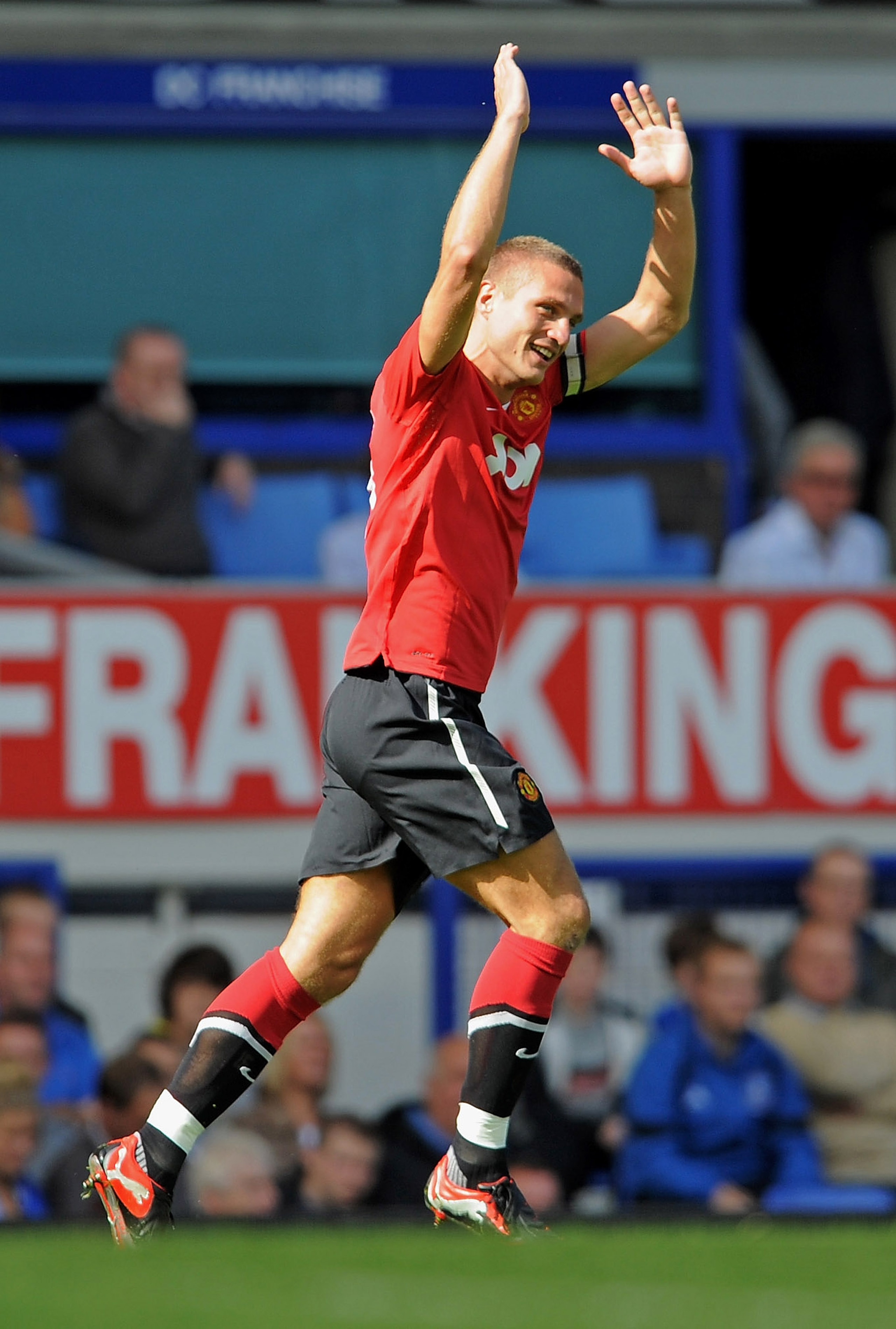 LIVERPOOL, ENGLAND - SEPTEMBER 11: Nemanja Vidic of Manchester United celebrates his goal to make it 2-1 during the Barclays Premier League match between Everton and Manchester United at Goodison Park on September 11, 2010 in Liverpool, England.  (Photo b
