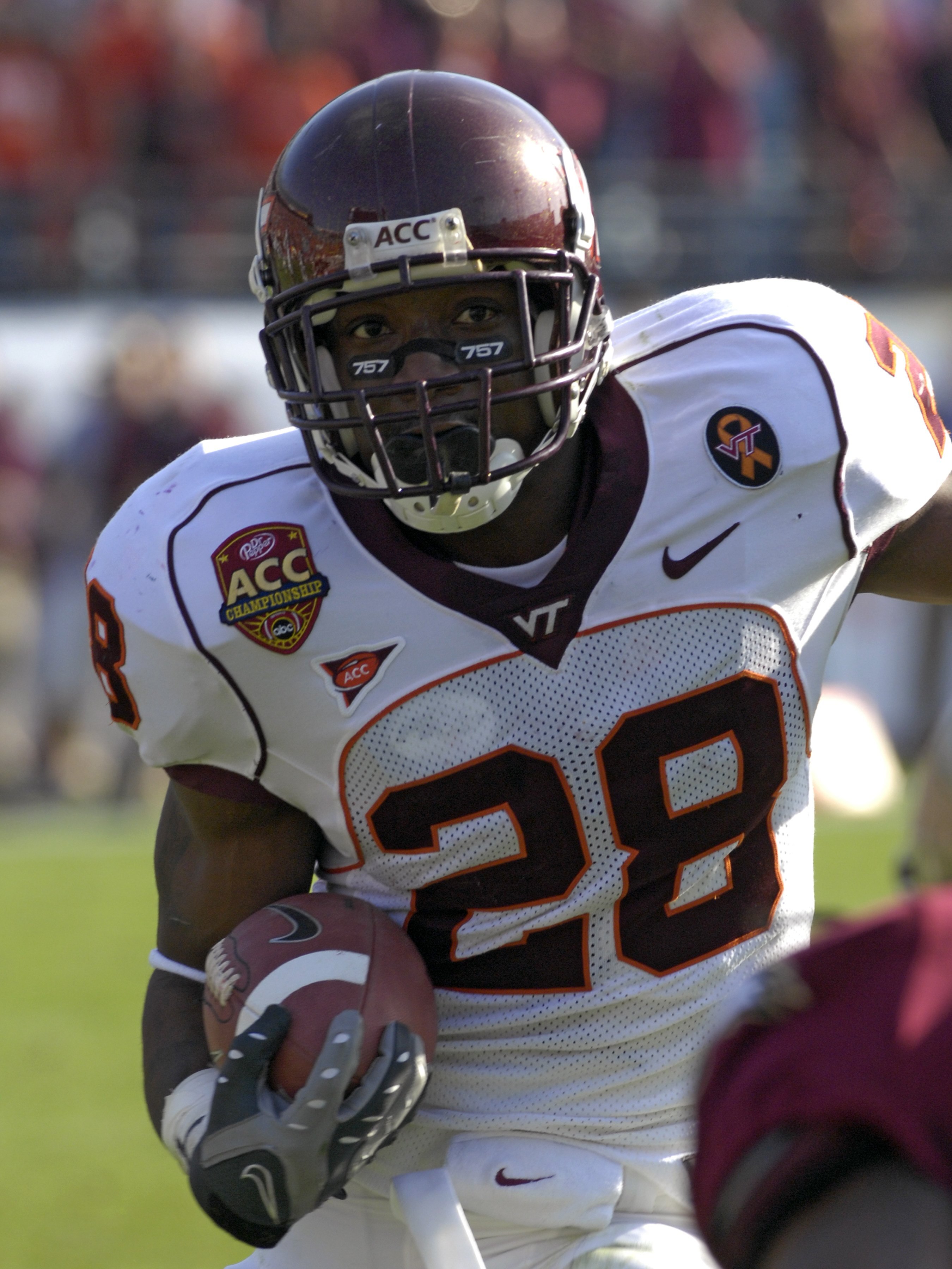 JACKSONVILLE, FL - DECEMBER 1: Running back Branden Ore #28  of the Virginia Tech Hokies rushes upfield against the Boston College Eagles in the ACC Championship Game at Jacksonville Municipal Stadium on December 1, 2007 in Jacksonville, Florida.  The Hok