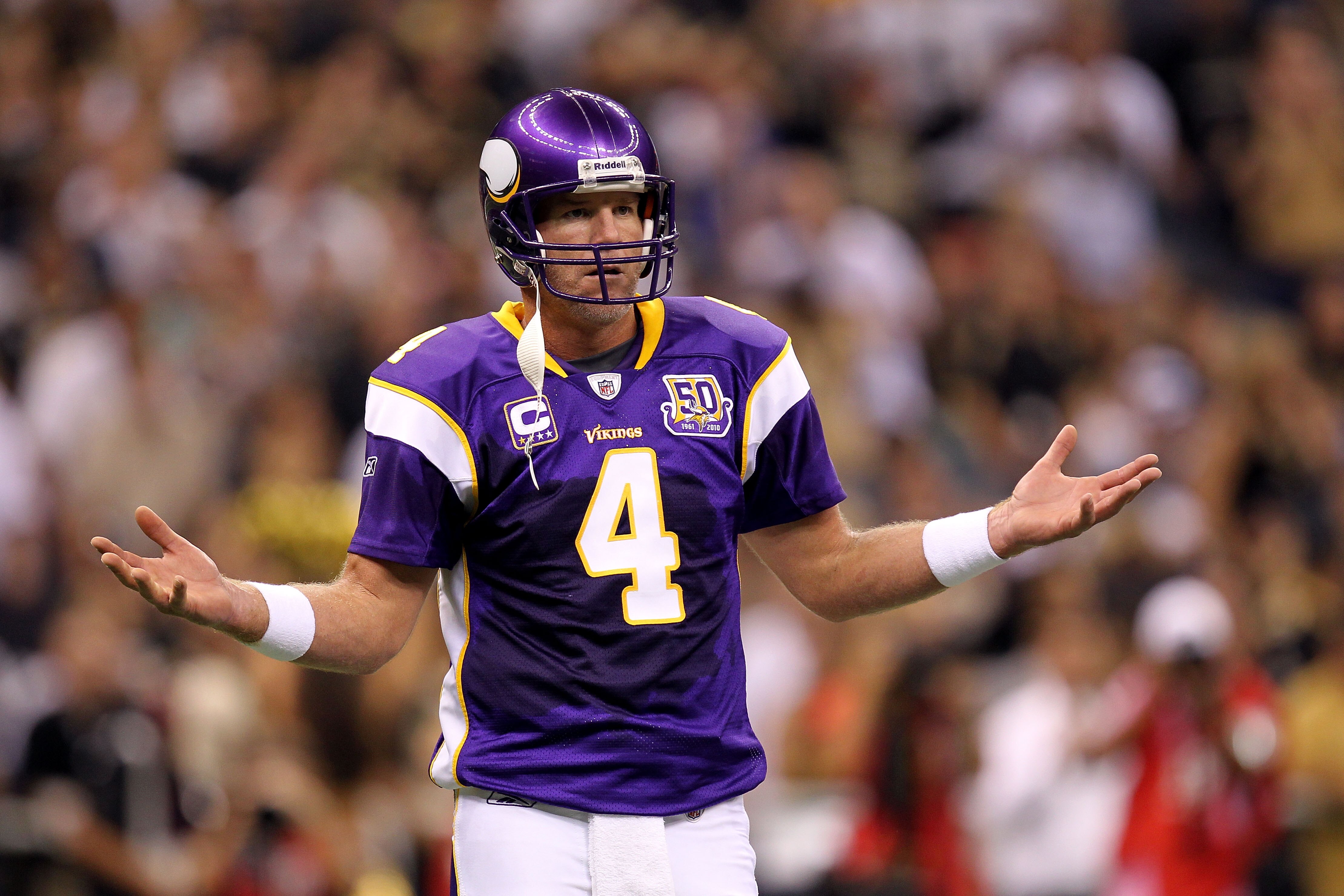 NEW ORLEANS - SEPTEMBER 09:  Quarterback Brett Favre #4 of the Minnesota Vikings reacts as he looks to the VIkings sideline against the New Orleans Saints at Louisiana Superdome on September 9, 2010 in New Orleans, Louisiana.  (Photo by Ronald Martinez/Ge