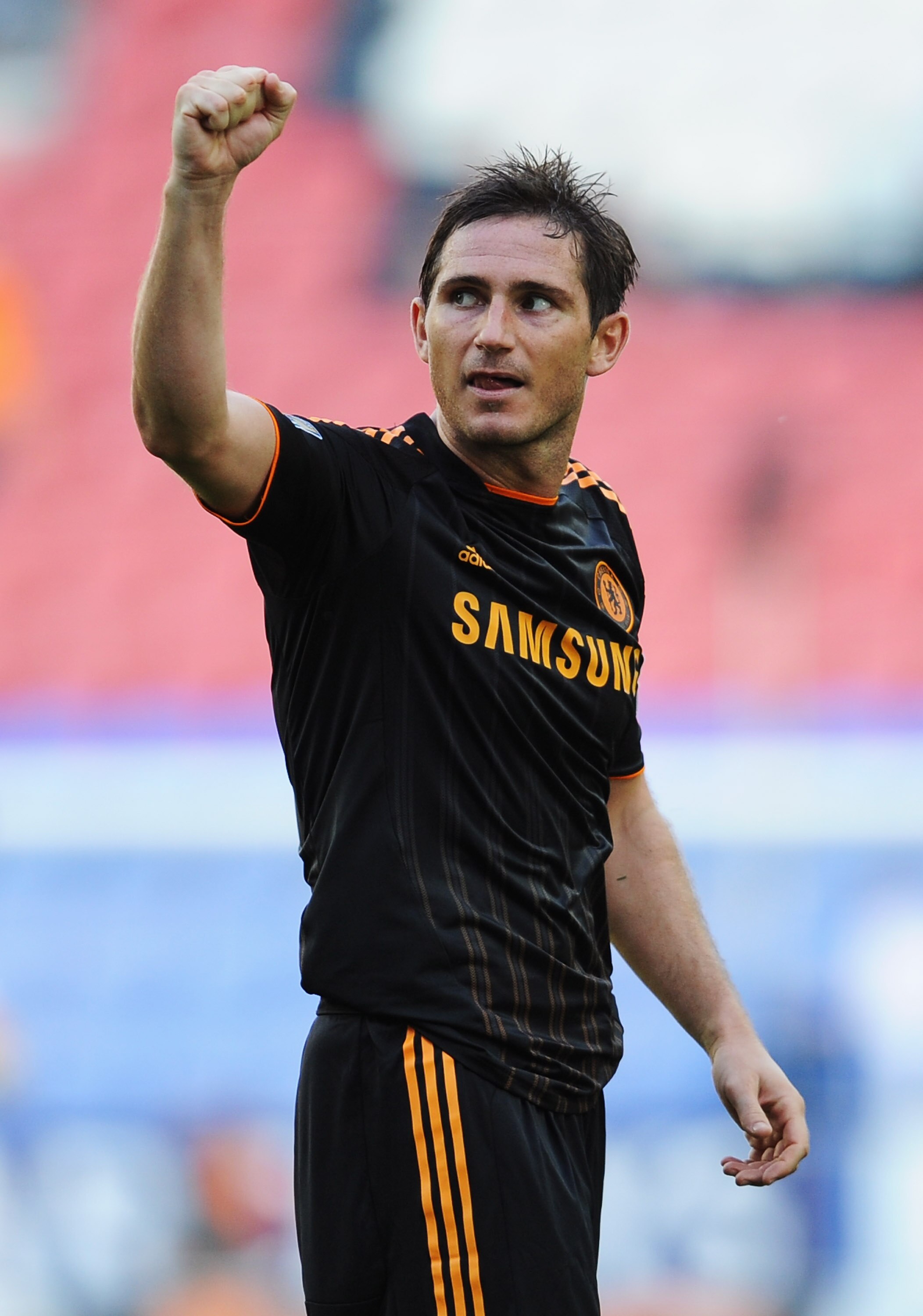 WIGAN, ENGLAND - AUGUST 21:  Frank Lampard of Chelsea celebrates victory after the Barclays Premier League match between Wigan Athletic and Chelsea at DW Stadium on August 21, 2010 in Wigan, England.  (Photo by Getty Images for Chelsea FC)