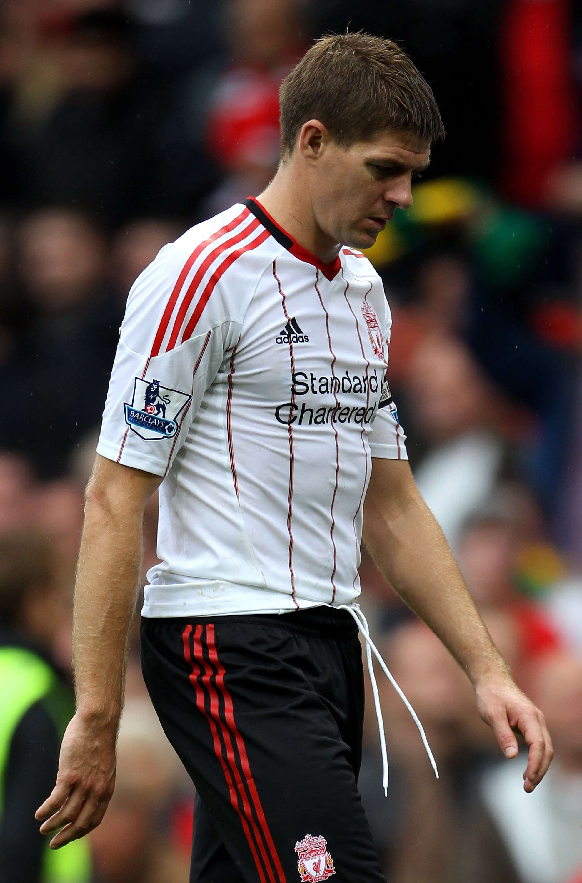 MANCHESTER, ENGLAND - SEPTEMBER 19:  Steven Gerrard of Liverpool leaves the pitch at the end of the Barclays Premier League match between Manchester United and Liverpool at Old Trafford on September 19, 2010 in Manchester, England.  (Photo by Alex Livesey
