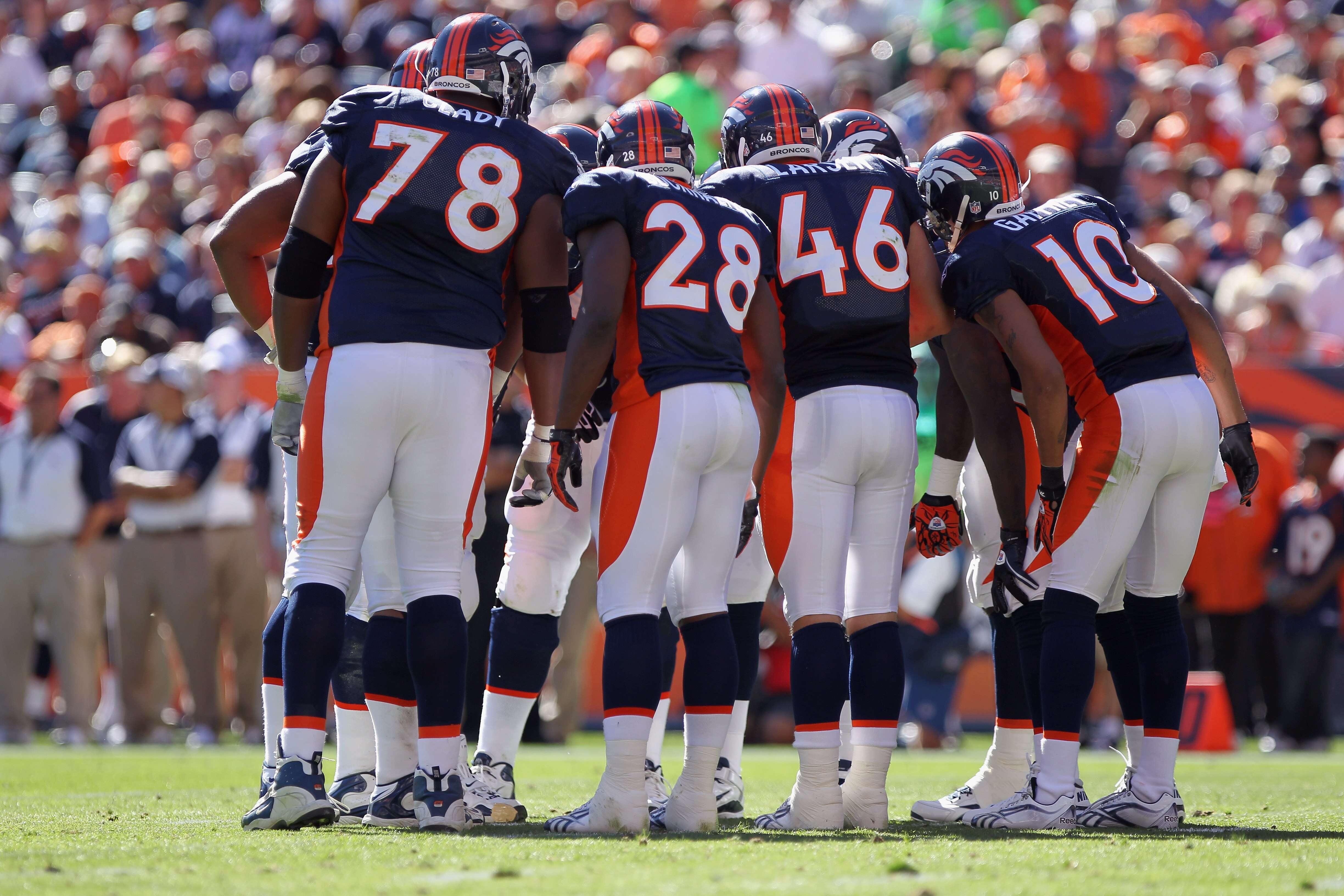 DENVER - SEPTEMBER 19:  The Denver Broncos offense huddle up as they face the Seattle Seahawks at INVESCO Field at Mile High on September 19, 2010 in Denver, Colorado. The Broncos defeated the Seahawks 31-14.  (Photo by Doug Pensinger/Getty Images)