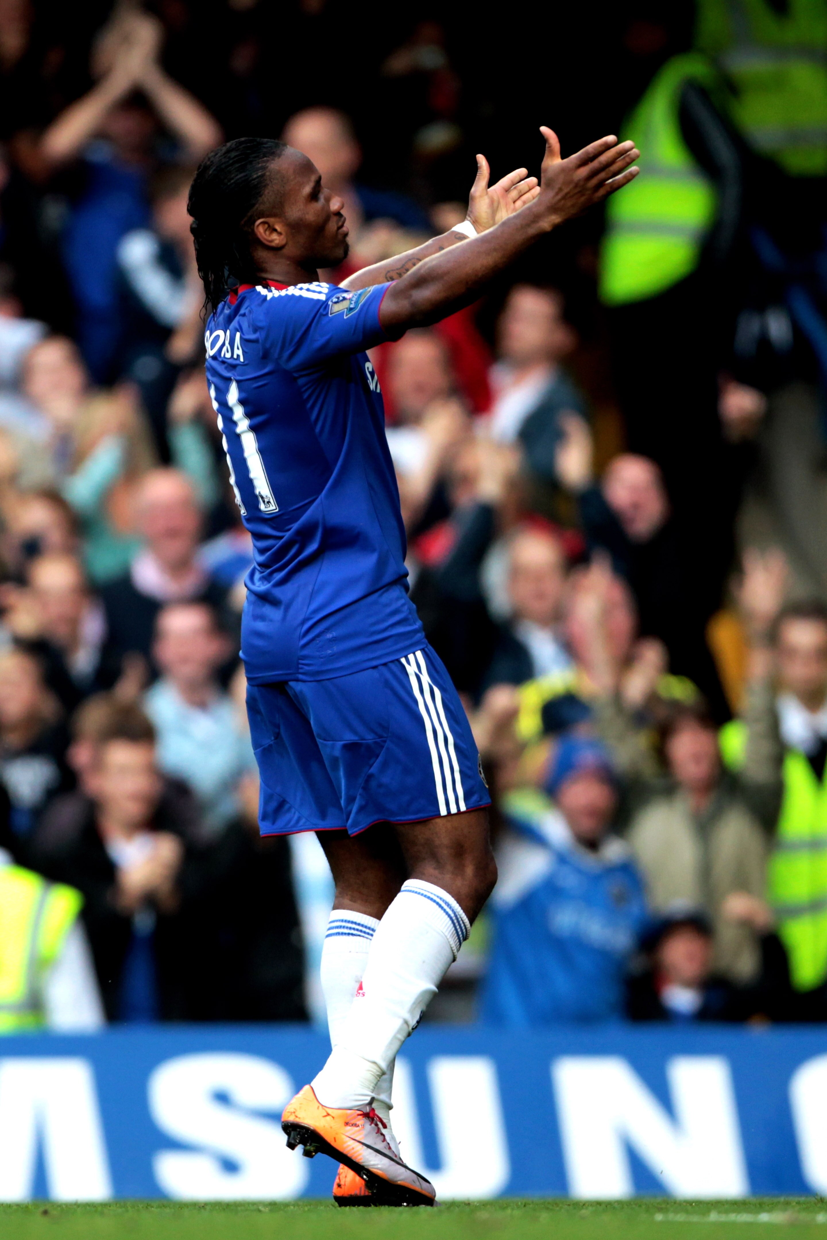 LONDON, ENGLAND - AUGUST 14:  Didier Drogba #11 celebrates after scoring his team's second goal during the Barclays Premier League match between Chelsea and West Bromwich Albion at Stamford Bridge on August 14, 2010 in London, England.  (Photo by Phil Col