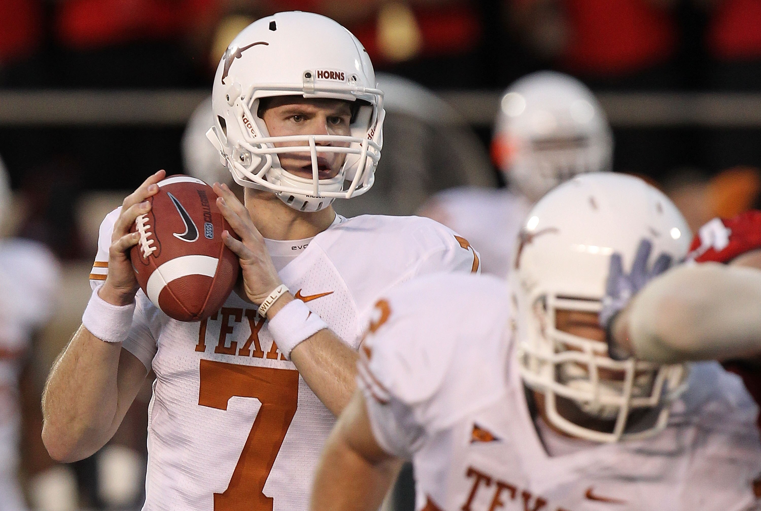 LUBBOCK, TX - SEPTEMBER 18:  Quarterback Garrett Gilbert #7 of the Texas Longhorns at Jones AT&T Stadium on September 18, 2010 in Lubbock, Texas.  (Photo by Ronald Martinez/Getty Images)