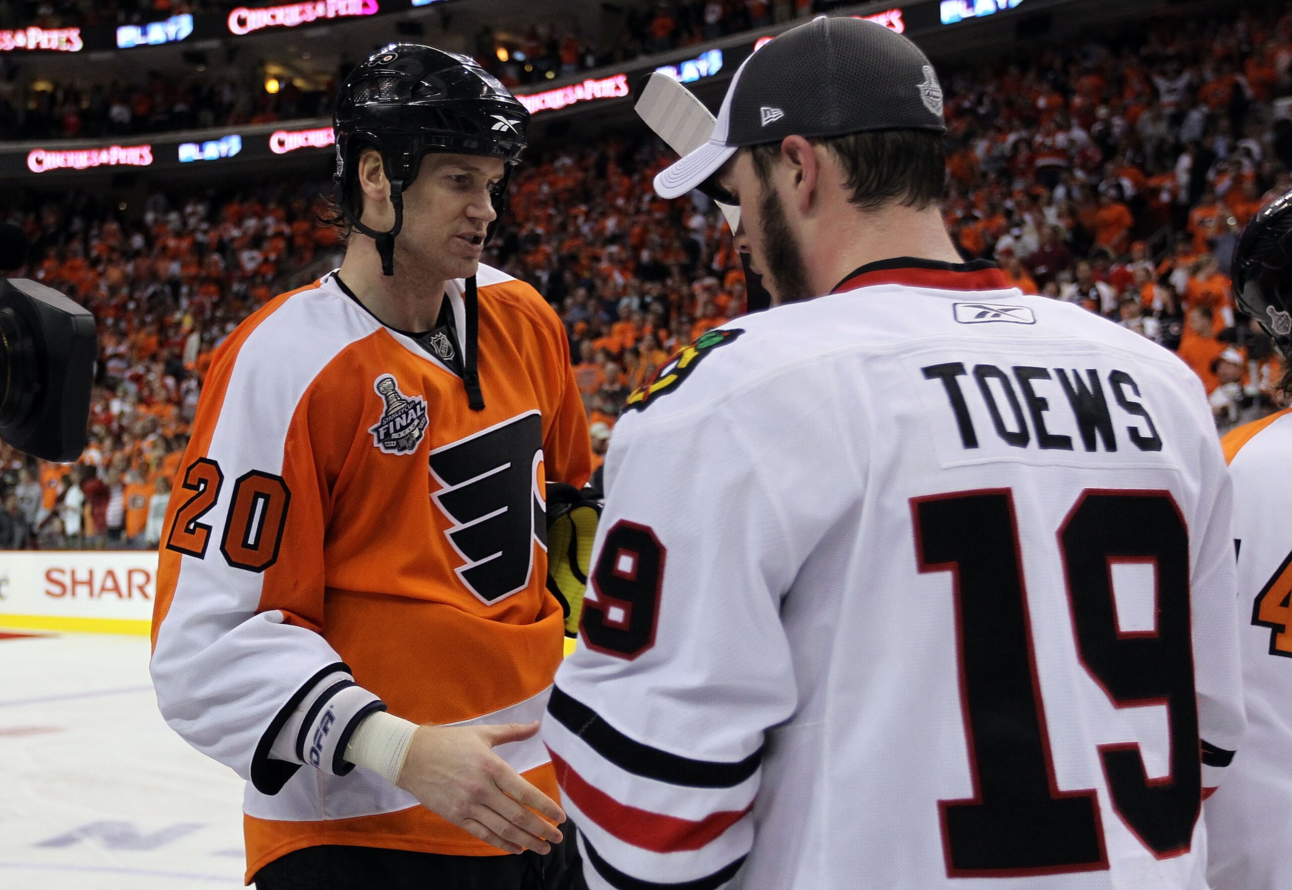 PHILADELPHIA - JUNE 09:  Jonathan Toews #19 of the Chicago Blackhawks shakes hands with Chris Pronger #20 of the Philadelphia Flyers after the Blackhawks defeated the Philadelphia Flyers 4-3 to win the Stanley Cup in Game Six of the 2010 NHL Stanley Cup F