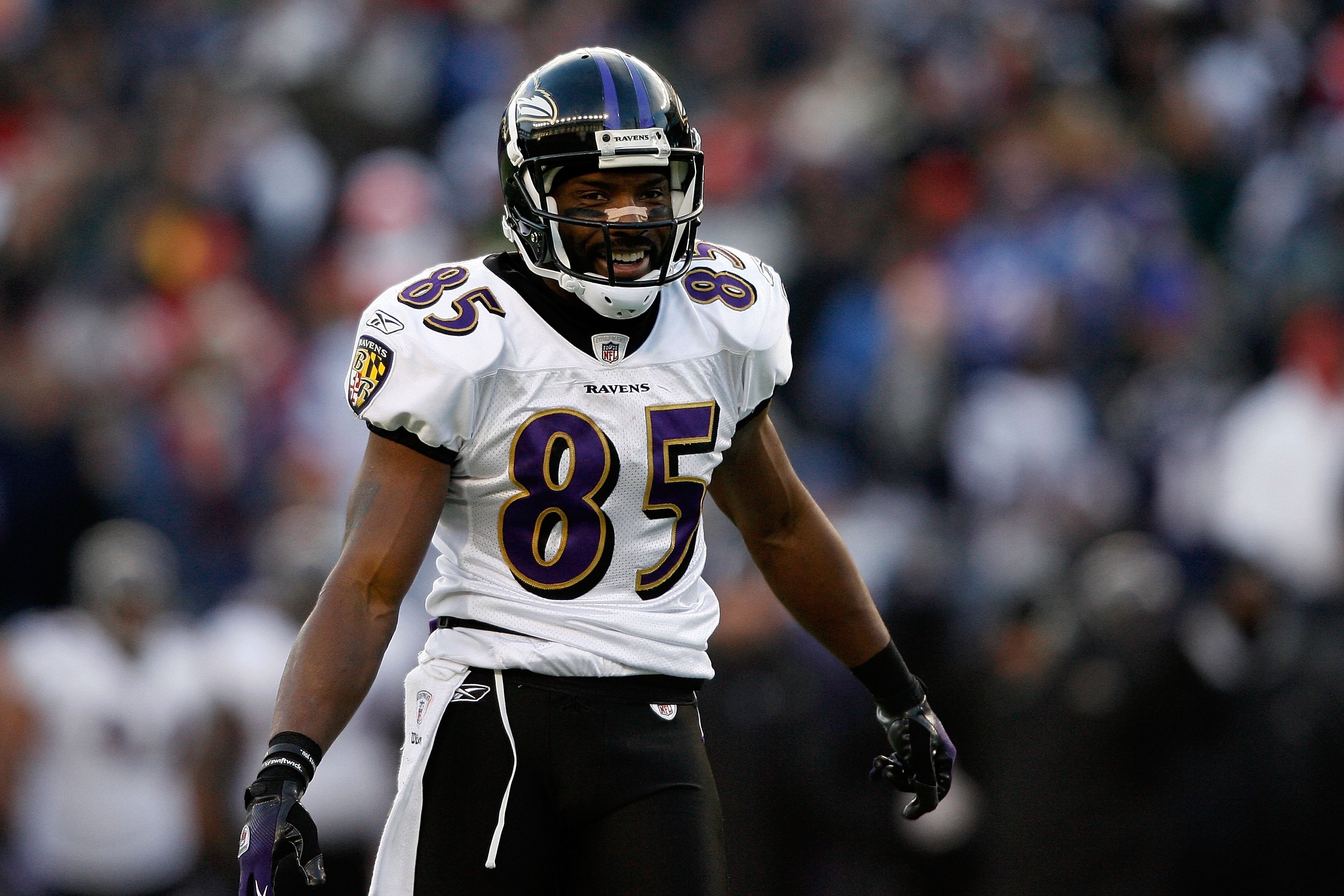 FOXBORO, MA - JANUARY 10:  Derrick Mason #85 of the Baltimore Ravens smiles on the field against the New England Patriots during the 2010 AFC wild-card playoff game at Gillette Stadium on January 10, 2010 in Foxboro, Massachusetts. The Ravens won 33-14. (