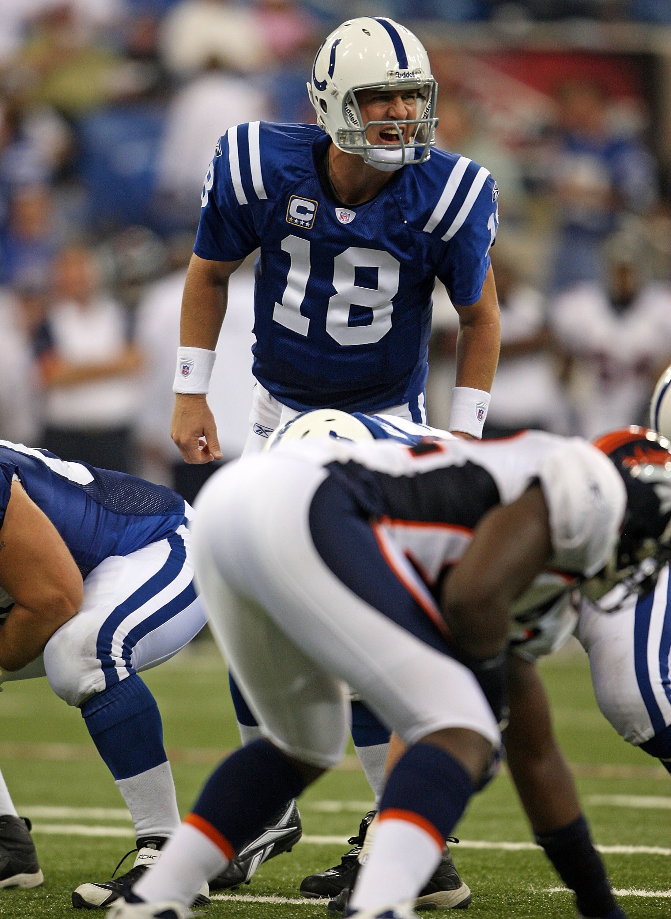 INDIANAPOLIS - SEPTEMBER 30:  Peyton Manning #18 of the Indianapolis Colts gives instructions to his team against the Denver Broncos during the NFL game on September 30, 2007 at the RCA Dome in Indianapolis, Indiana.  (Photo by Andy Lyons/Getty Images)