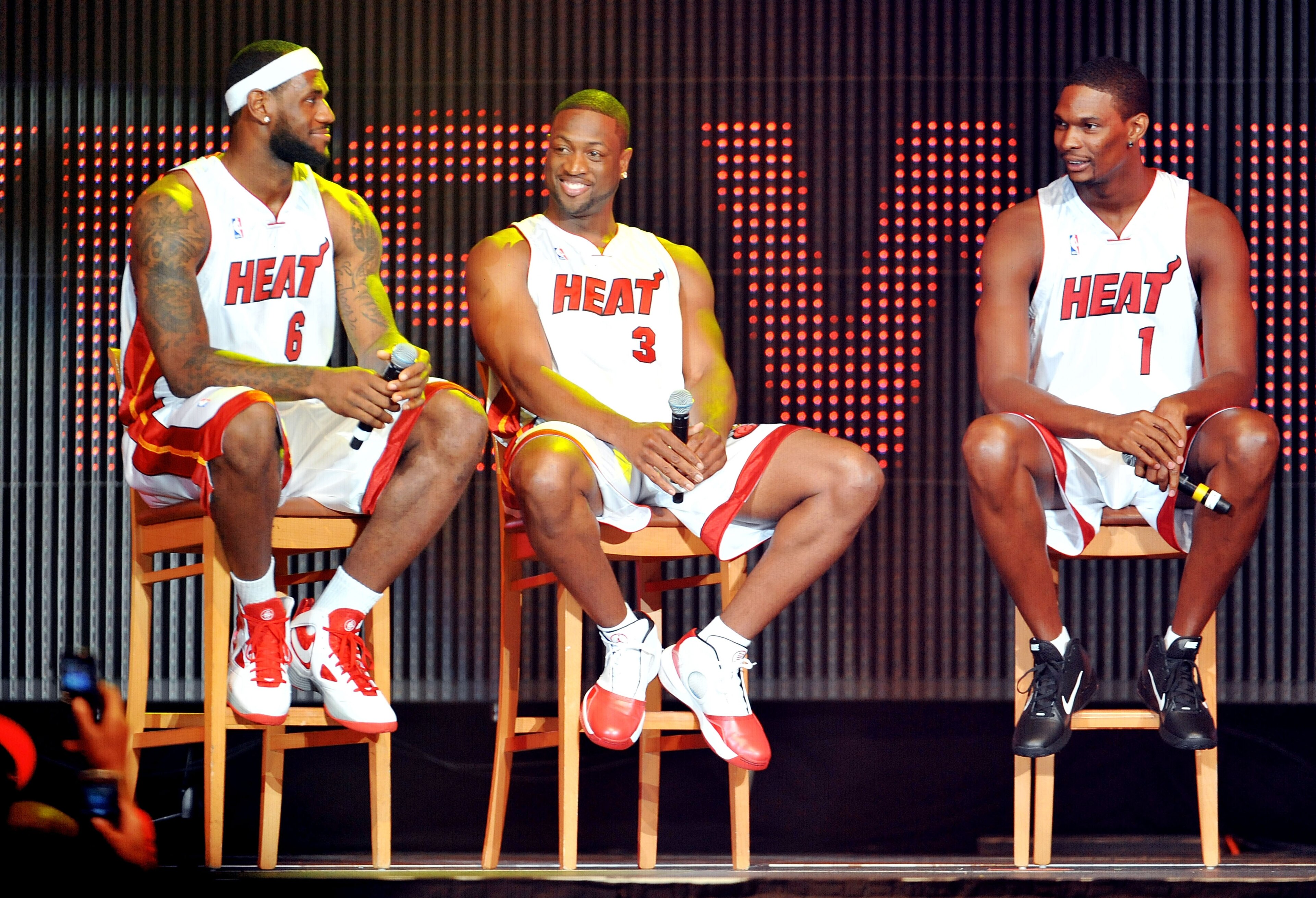 MIAMI - JULY 09: LeBron James #6, Dwyane Wade #3 and Chris Bosh #1 of the Miami Heat speak after being introduced to fans during a welcome party at American Airlines Arena on July 9, 2010 in Miami, Florida. (Photo by Doug Benc/Getty Images) MIAMI - JULY 09: LeBron James #6, Dwyane Wade #3 and Chris Bosh #1 of the Miami Heat speak after being introduced to fans during a welcome party at American Airlines Arena on July 9, 2010 in Miami, Florida. (Photo by Doug Benc/Getty Images)