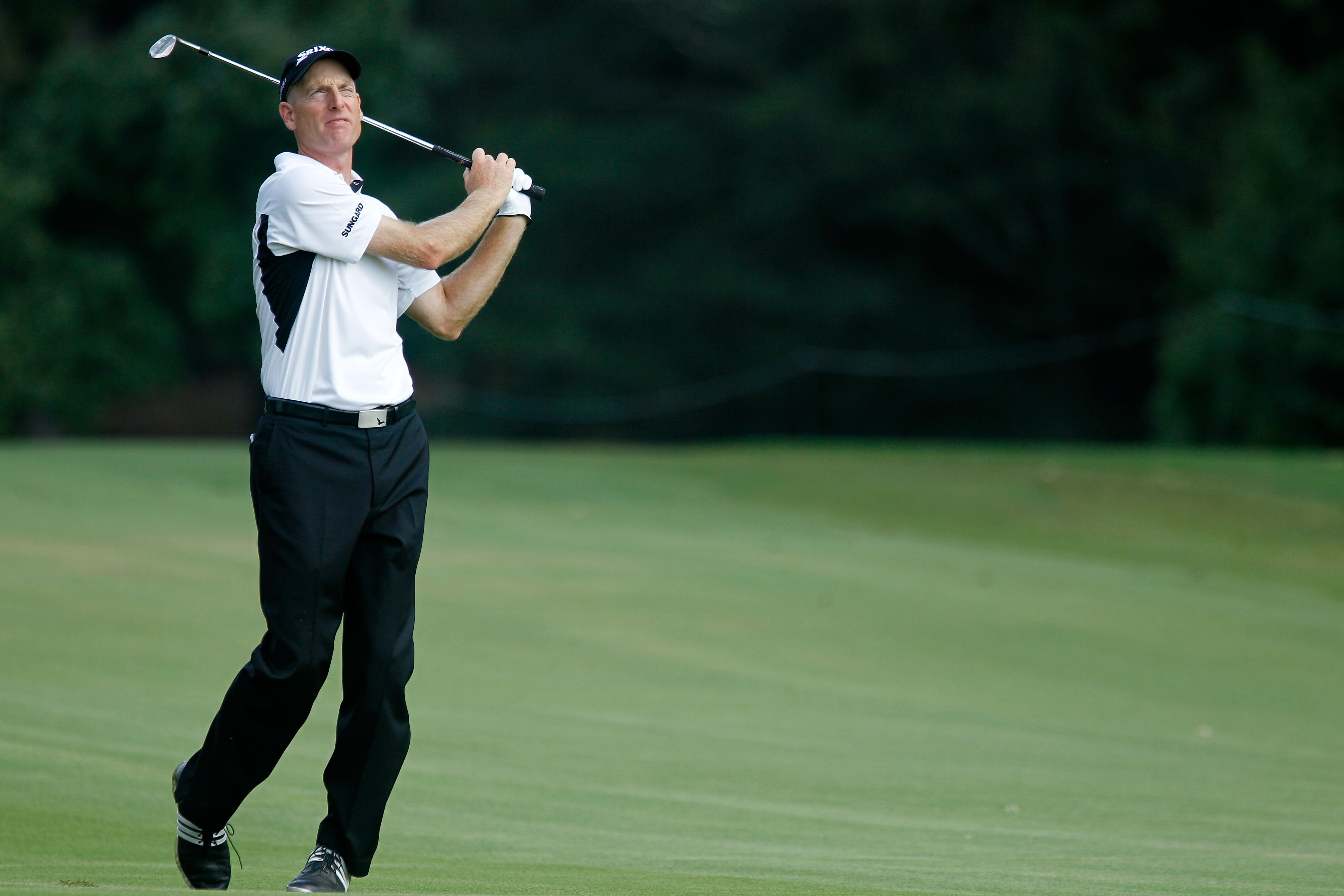 ATLANTA - SEPTEMBER 23:  Jim Furyk hits his approach shot on the 14th hole during the first round of THE TOUR Championship presented by Coca-Cola at East Lake Golf Club on September 23, 2010 in Atlanta, Georgia.  (Photo by Scott Halleran/Getty Images)