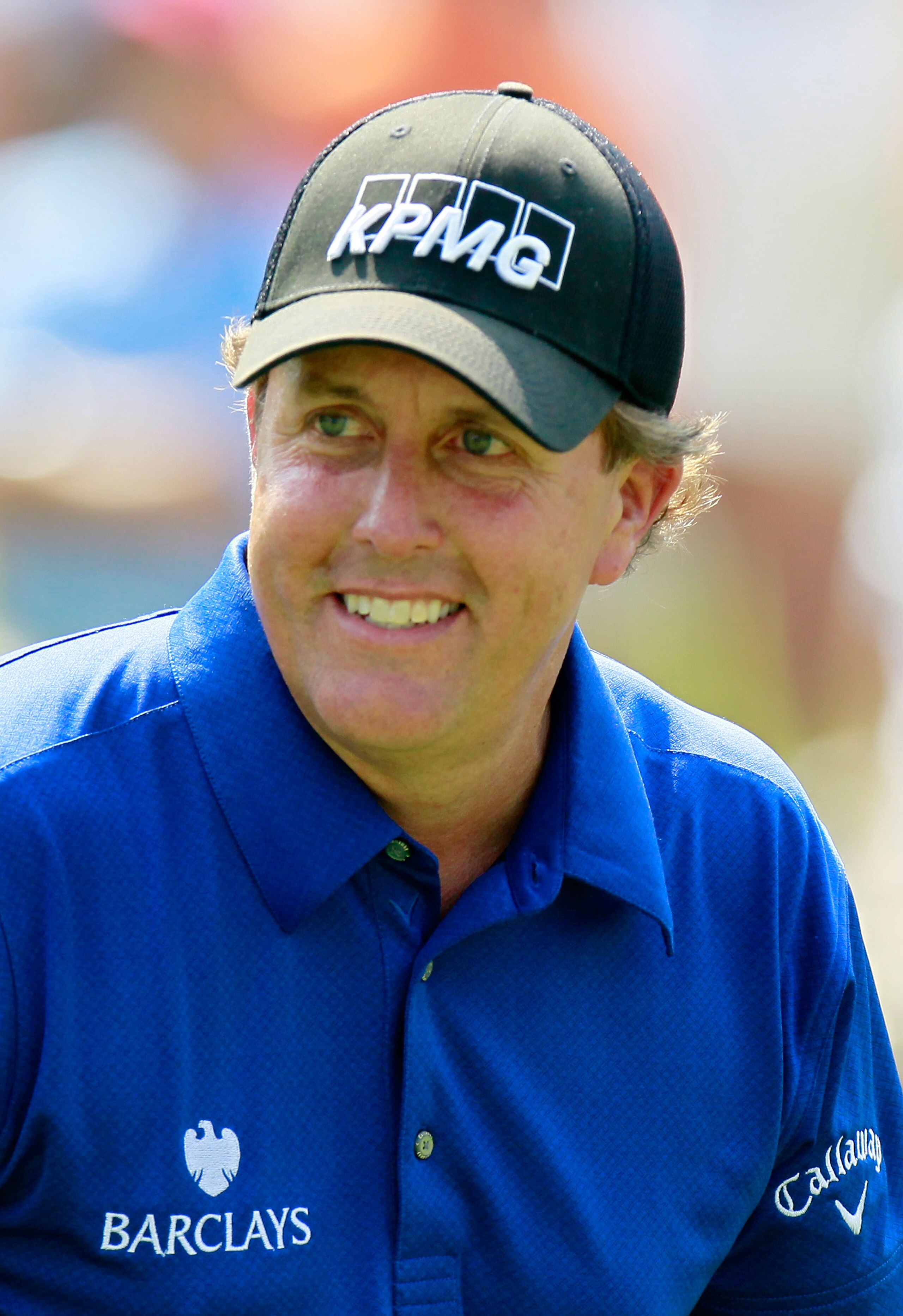 ATLANTA - SEPTEMBER 23:  Phil Mickelson smiles as he walks off the eighth tee during the first round of THE TOUR Championship presented by Coca-Cola at East Lake Golf Club on September 23, 2010 in Atlanta, Georgia.  (Photo by Kevin C. Cox/Getty Images)