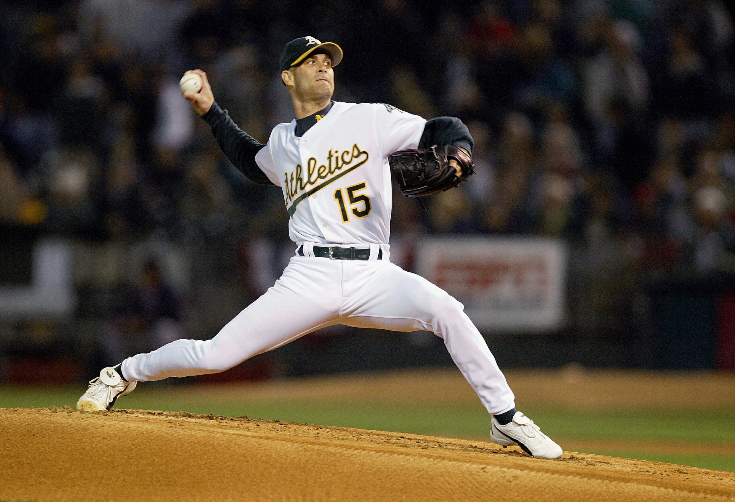 OAKLAND, CA - OCTOBER 1: Tim Hudson #15 of the Oakland A's pitches against the Boston Red Sox during the first inning of Game 1 of the 2003 American League Division Series on October 1, 2003 at Network Associates Coliseum in Oakland, California. (Photo b OAKLAND, CA - OCTOBER 1: Tim Hudson #15 of the Oakland A's pitches against the Boston Red Sox during the first inning of Game 1 of the 2003 American League Division Series on October 1, 2003 at Network Associates Coliseum in Oakland, California. (Photo b