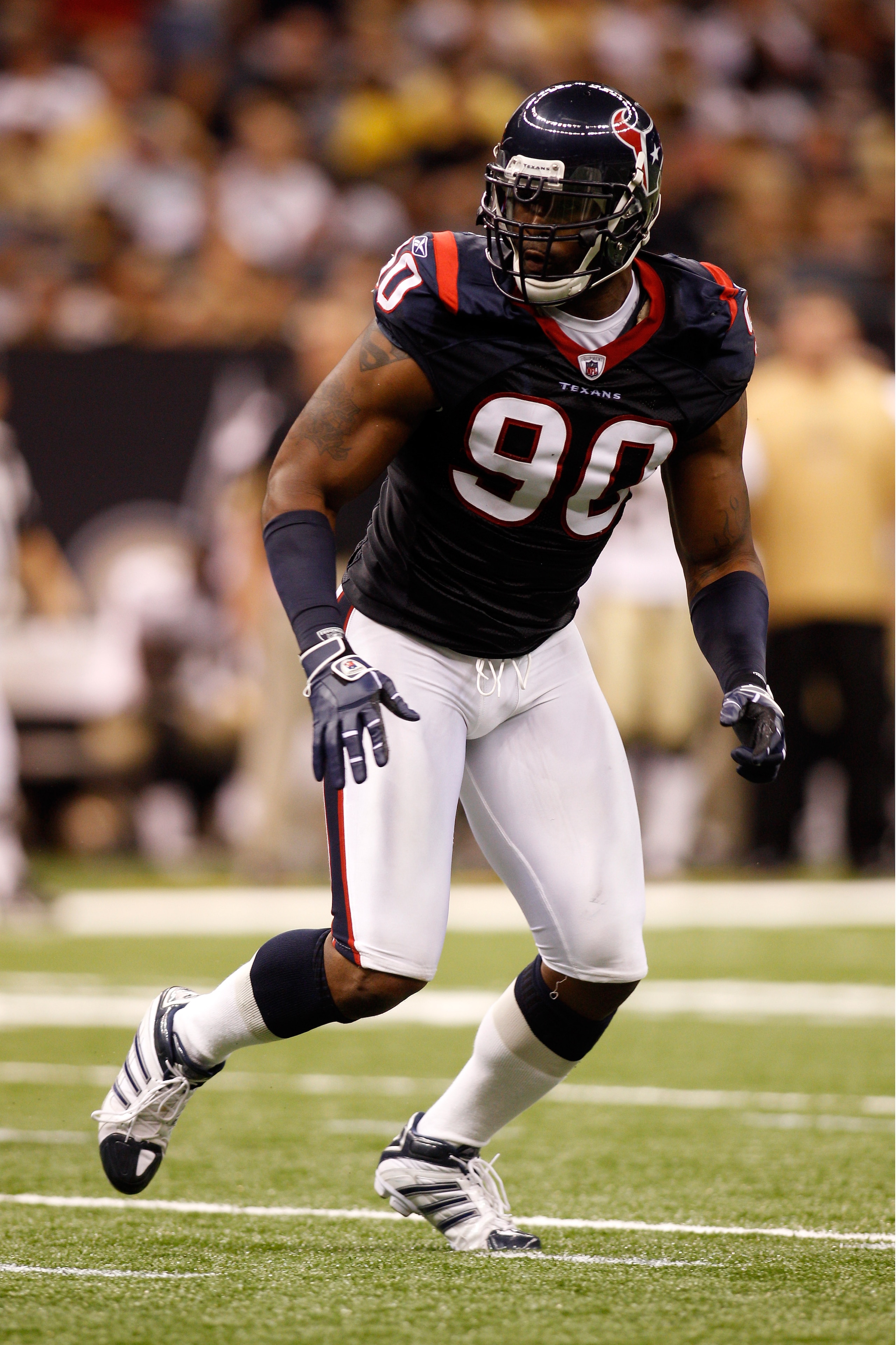 NEW ORLEANS - AUGUST 21:  Mario Williams #90 of the Houston Texans in action during the game against the New Orleans Saints at the Louisiana Superdome on August 21, 2010 in New Orleans, Louisiana.  (Photo by Chris Graythen/Getty Images)