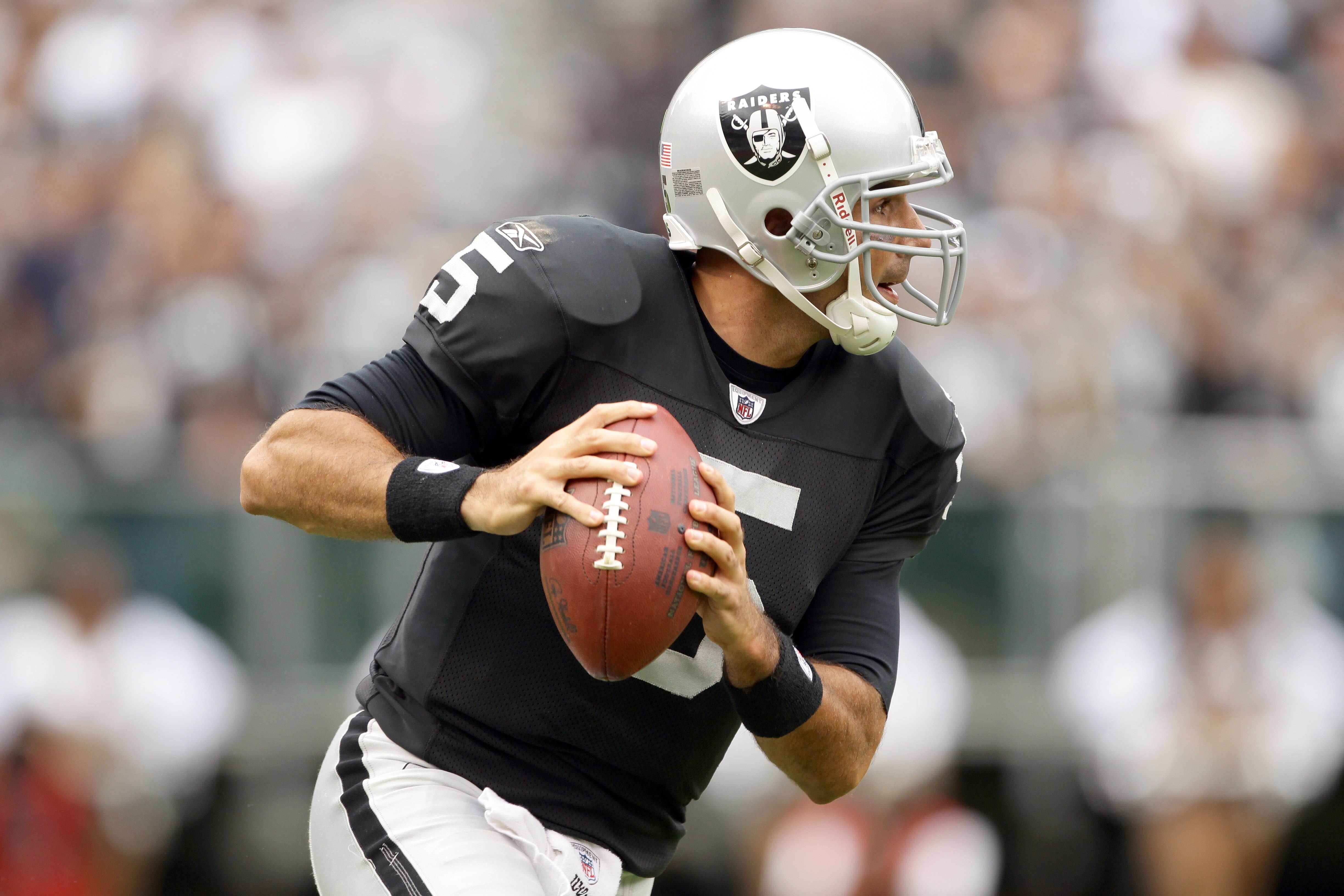 OAKLAND, CA - SEPTEMBER 19: Bruce Gradkowski #5 of the Oakland Raiders in action during their game against the St. Louis Rams at the Oakland-Alameda County Coliseum on September 19, 2010 in Oakland, California. (Photo by Ezra Shaw/Getty Images) OAKLAND, CA - SEPTEMBER 19: Bruce Gradkowski #5 of the Oakland Raiders in action during their game against the St. Louis Rams at the Oakland-Alameda County Coliseum on September 19, 2010 in Oakland, California. (Photo by Ezra Shaw/Getty Images)
