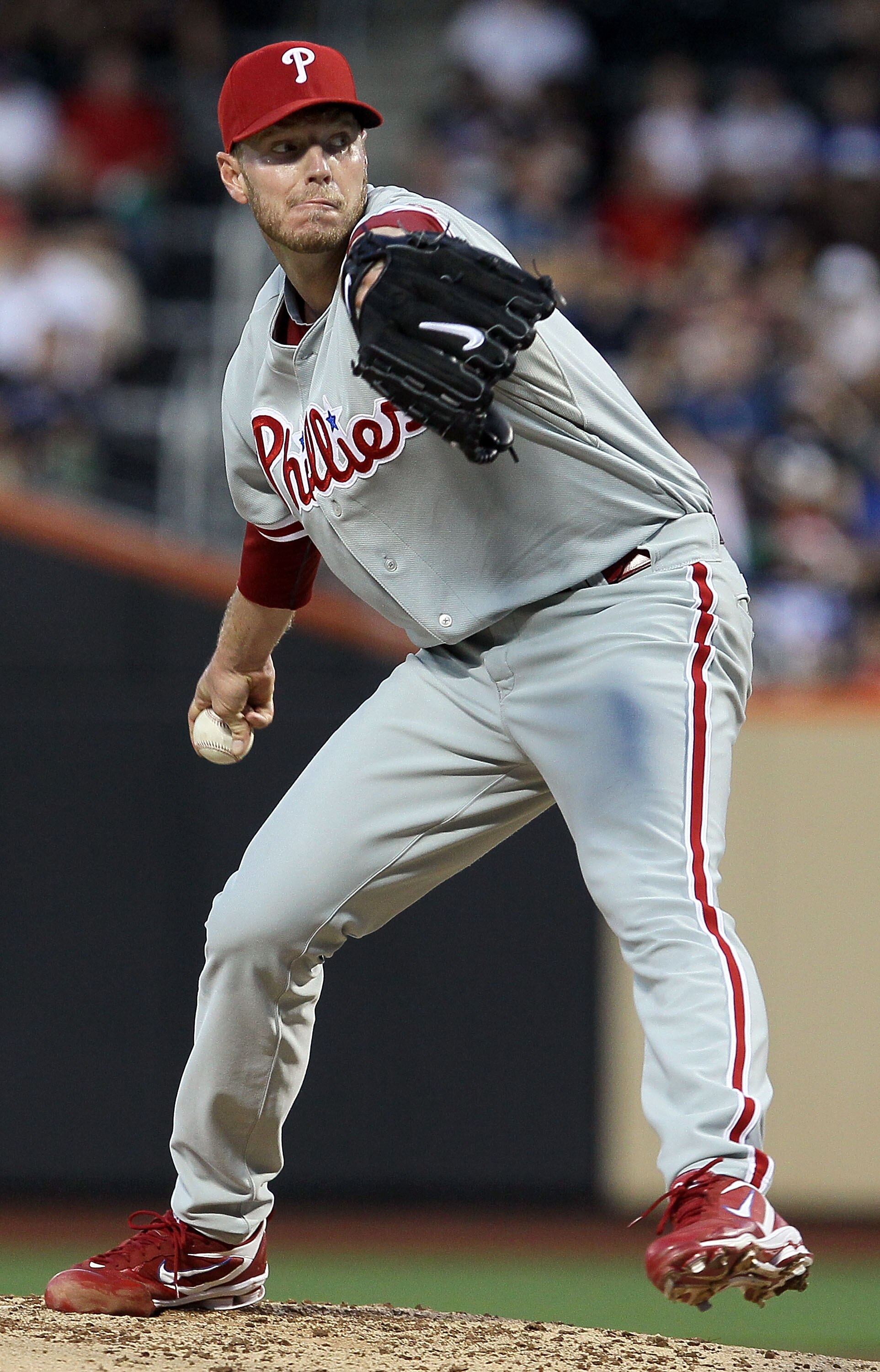 NEW YORK - AUGUST 14:  Roy Halladay #34 of the Philadelphia Phillies delivers a pitch against the New York Mets on August 14, 2010 at Citi Field in the Flushing neighborhood of the Queens borough of New York City.  (Photo by Jim McIsaac/Getty Images)