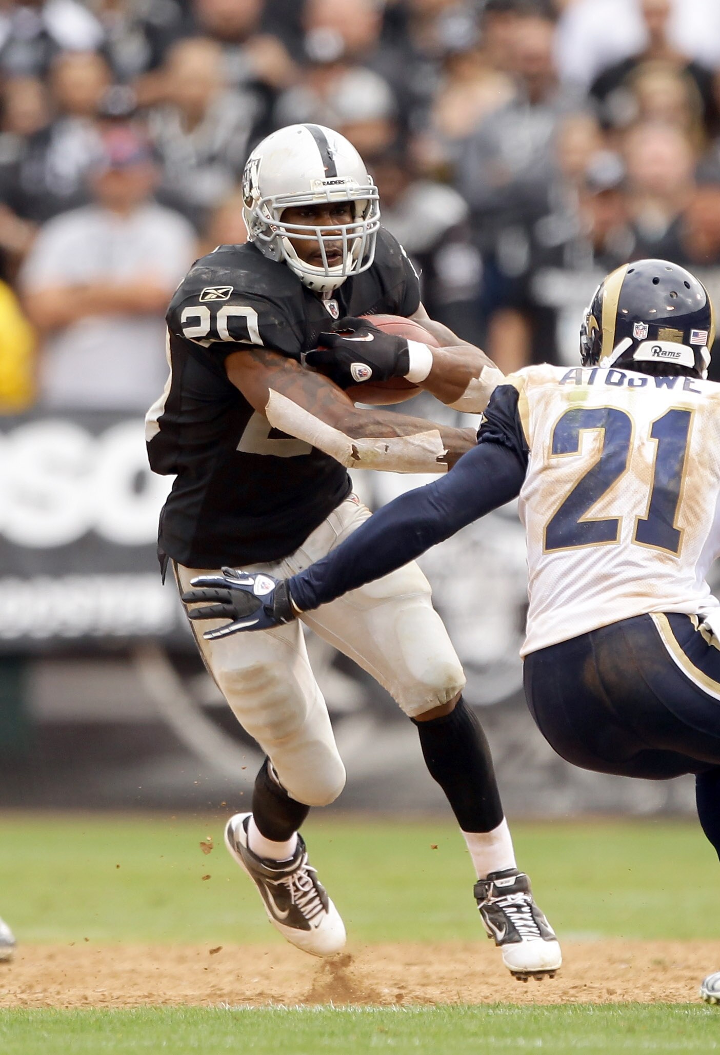 OAKLAND, CA - SEPTEMBER 19: Darren McFadden #20 of the Oakland Raiders in action during their game against the St. Louis Rams at the Oakland-Alameda County Coliseum on September 19, 2010 in Oakland, California. (Photo by Ezra Shaw/Getty Images) OAKLAND, CA - SEPTEMBER 19: Darren McFadden #20 of the Oakland Raiders in action during their game against the St. Louis Rams at the Oakland-Alameda County Coliseum on September 19, 2010 in Oakland, California. (Photo by Ezra Shaw/Getty Images)