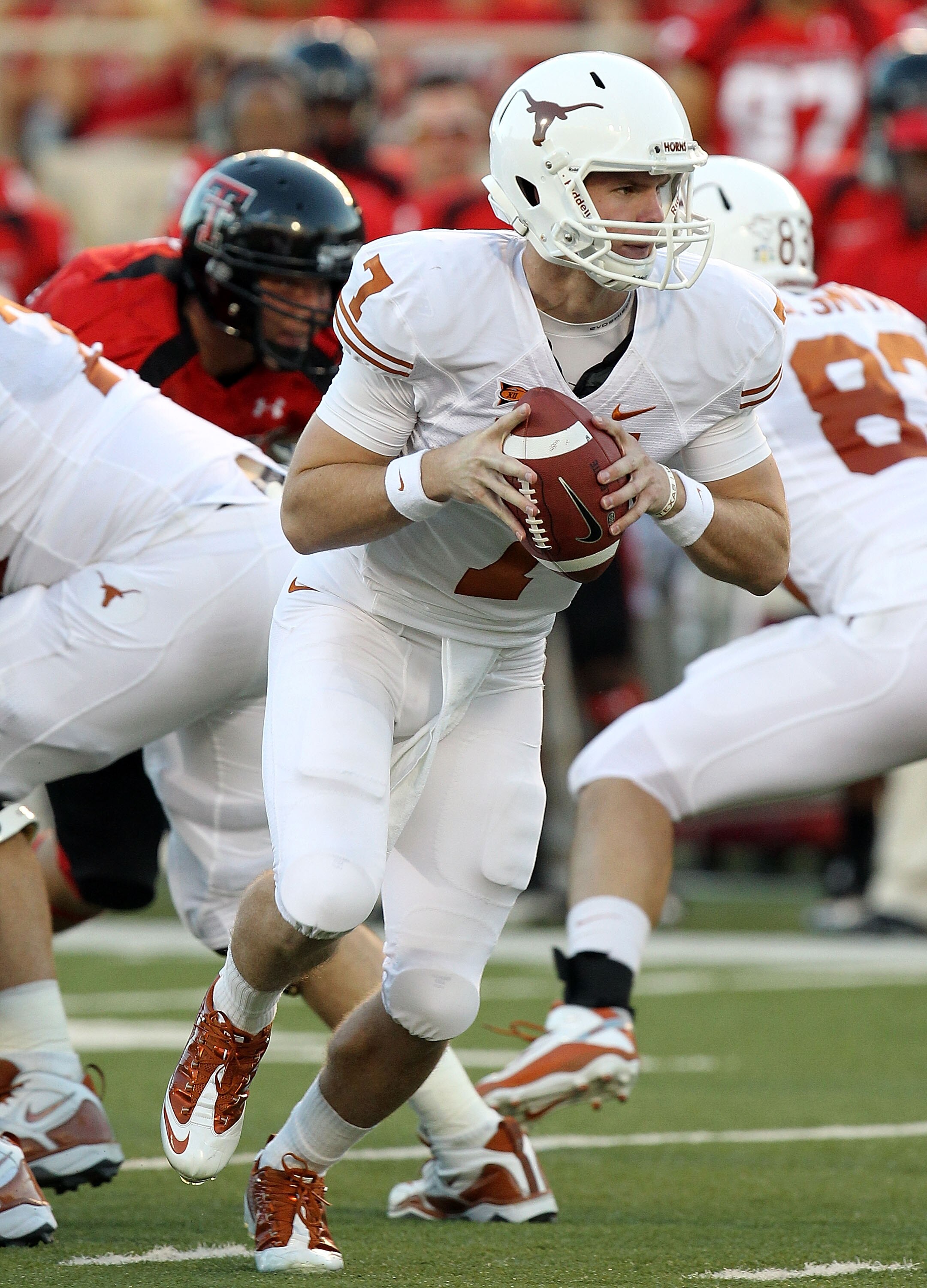 LUBBOCK, TX - SEPTEMBER 18:  Quarterback Garrett Gilbert #7 of the Texas Longhorns at Jones AT&T Stadium on September 18, 2010 in Lubbock, Texas.  (Photo by Ronald Martinez/Getty Images)