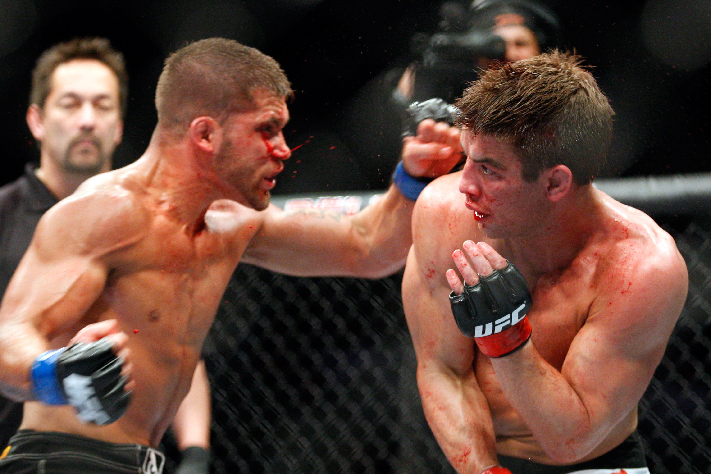 MONTREAL- MAY 8:Jeremy Stephens (L) punches Sam Stout in their lightweight 'swing' bout at UFC 113 at Bell Centre on May 8, 2010 in Montreal, Quebec, Canada. Jeremy Stephens won the bout by KO. (Photo by Richard Wolowicz/Getty Images)