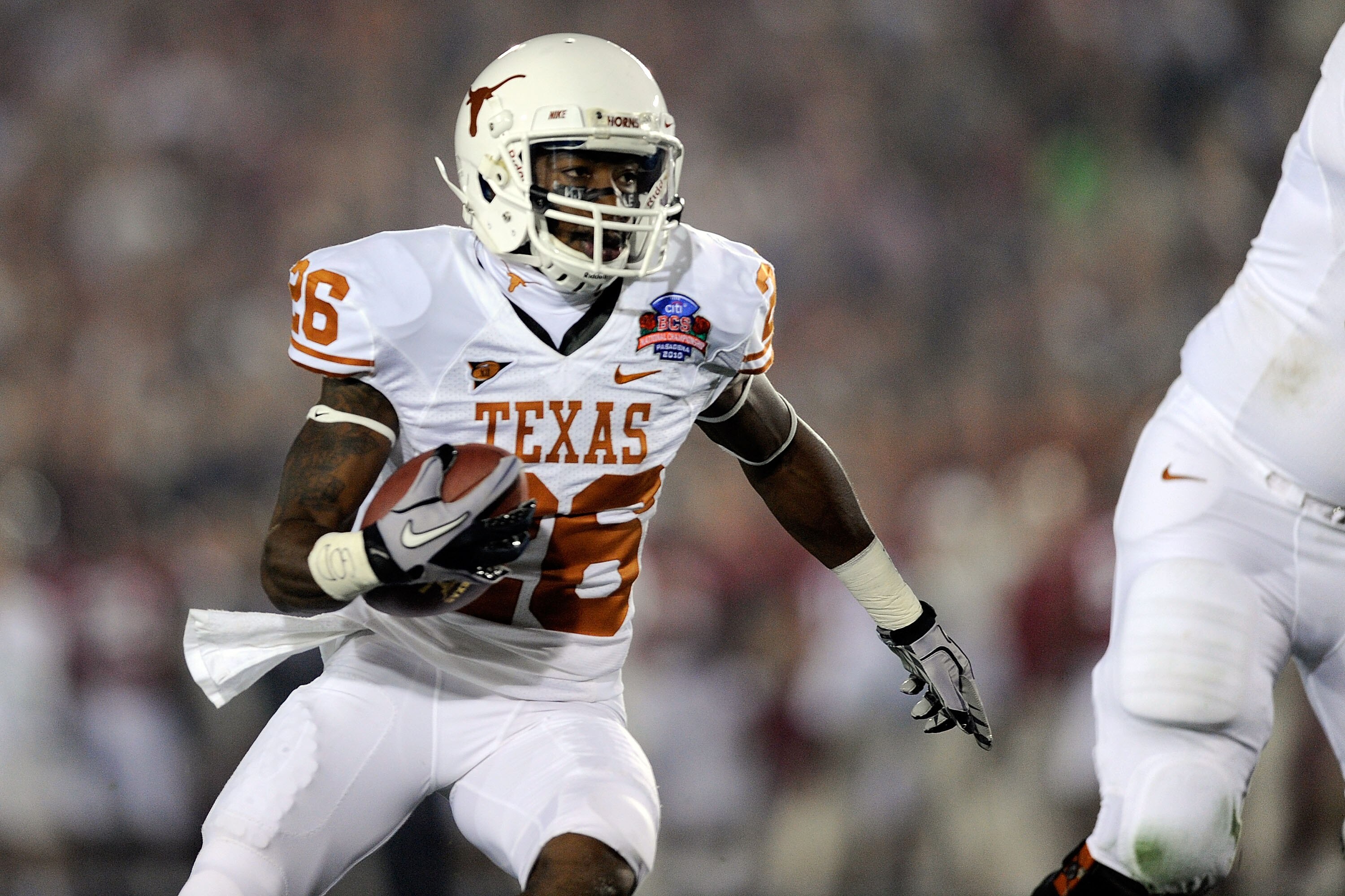 PASADENA, CA - JANUARY 07:  Wide Receiver D.J. Monroe #26 of the Texas Longhorns runs with the ball against the Alabama Crimson Tide during the Citi BCS National Championship game at the Rose Bowl on January 7, 2010 in Pasadena, California.  (Photo by Kev