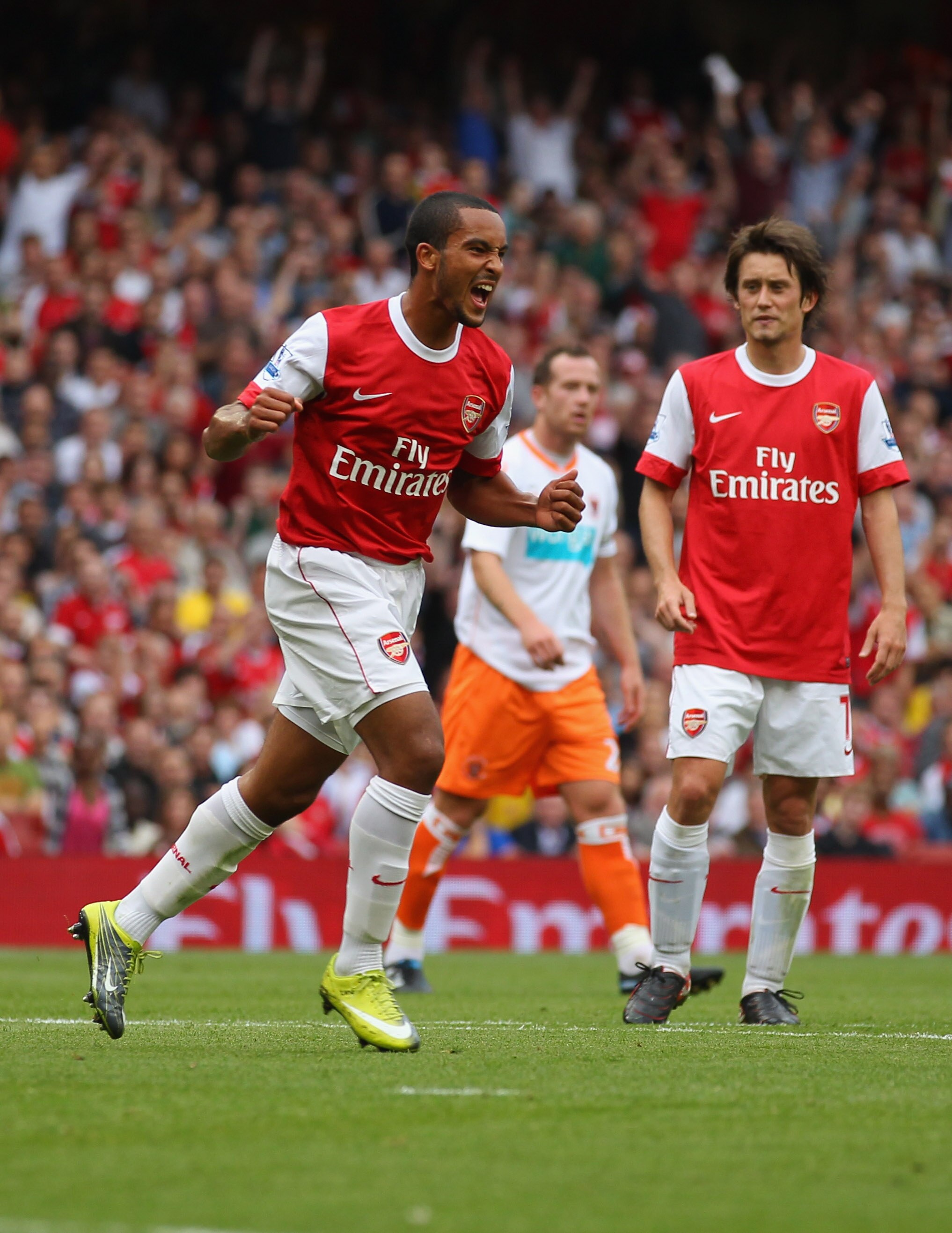 LONDON, ENGLAND - AUGUST 21: Theo Walcott of Arsenal celebrates his third goal during the Barclays Premier League match between Arsenal and Blackpool at The Emirates Stadium on August 21, 2010 in London, England. (Photo by Clive Rose/Getty Images) LONDON, ENGLAND - AUGUST 21: Theo Walcott of Arsenal celebrates his third goal during the Barclays Premier League match between Arsenal and Blackpool at The Emirates Stadium on August 21, 2010 in London, England. (Photo by Clive Rose/Getty Images)